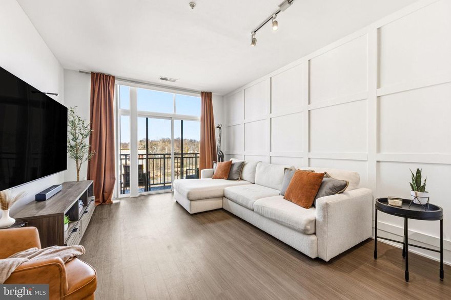 Welcome to Unit 557 at 145 Riverhaven, a top-floor penthouse residence in The Haven at National Harbor, offering sweeping northwesterly views and an abundance of natural light throughout. This beautifully updated unit features a modern, open floor plan with upgraded accent walls, stylish lighting, and contemporary finishes that create a polished yet inviting feel. The spacious gourmet kitchen is ideal for entertaining and everyday living, complete with stainless steel appliances and seamless flow into the living and dining areas. The bedroom is generously sized with a large walk-in closet, and the unit also includes an updated washer and dryer for added convenience.

Located just steps from the waterfront, shops, and dining, this home delivers the full National Harbor lifestyle. The building’s amenities are truly exceptional, including an outdoor pool, full fitness center and yoga studio, resident lounge and meeting rooms, pool table, common-area fireplaces, front desk concierge, secure entry, illuminated elevators at night, and assigned covered parking with direct indoor access to the unit. With gorgeous views, endless amenities, and a premier location, this penthouse offers luxury, convenience, and lifestyle all in one.