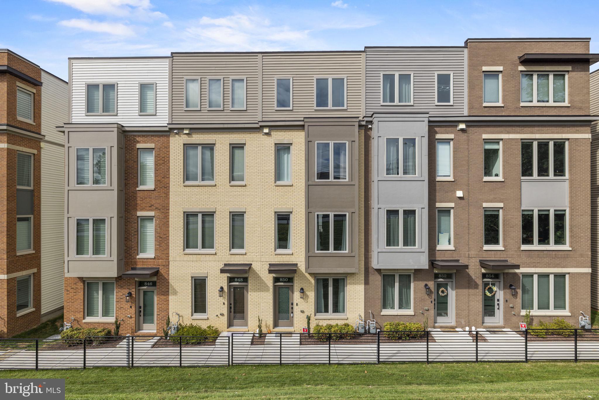 Welcome to Chapman Row, a vibrant and contemporary community nestled in the heart of North Bethesda, only blocks away from the Twinbrook Metro. This stunning 3 years young 3 bedroom, 3.5 bathroom townhome offers an array of luxurious features and a prime location that serves the ultimate convenience.
Enter the home on the ground level housing a bonus space with garage access that would be perfect for an office, home gym, or lounge area. Enjoy the convenience of parking in the attached 1-car garage, ensuring that your vehicle is always protected from the elements.
Step up to the main (second) level and be greeted by an inviting open floor plan that seamlessly blends style and functionality. The spacious living area is flooded with natural light, creating a warm and welcoming ambiance as well as an opportunity to get cozy with the gas fireplace. The gourmet kitchen is a culinary enthusiast's dream, boasting stainless steel appliances, sleek quartz countertops, and ample storage space for all your cooking essentials. Additionally, a balcony off the kitchen provides the perfect setting for sipping your morning coffee or enjoying al fresco meals in the fresh air.
As you ascend to the third floor there are two bedrooms both with gracious closet space ensuite bathrooms. Make your way to the fourth floor and discover an additional spacious bedroom, full bathroom, and the loft - a versatile space that can be transformed into a home office, a cozy reading nook, or even a play area for little ones. The possibilities are endless! Don’t miss the rooftop deck with the panoramic views of the surrounding neighborhood. This is the perfect spot to unwind after a long day or entertain guests under the starry night sky.
Located just a stone's throw away from the Twinbrook Metro station, commuting to work or exploring the vibrant city of Bethesda has never been easier. Chapman Row is a new community that offers a modern and urban lifestyle. Immerse yourself in the thriving local scene, with an abundance of dining, shopping, and entertainment options just moments away. Don't miss the opportunity to make this exquisite home in Chapman Row your own.