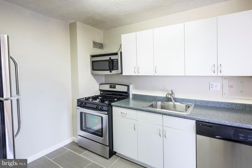 Close to Shirlington updated 1 bedroom apartment with all utilities included. Easy parking in surface lot. Minutes to Washington DC, Shirlington. 24 hour front desk. Updated kitchen, hardwood flooring, balcony, pets considered. Fantastic rental. Long term lease considered. Laundry on every floor of building. New lobby. Fitness Center.