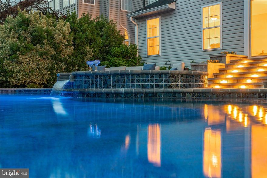 COMING SOON!   Welcome to 5404 Chillingham Place, where everyday living feels like a private resort retreat. Tucked away in the sought after Kingsbrook Community and surrounded by mature trees for added privacy, this stunning property offers the perfect blend of luxury, comfort, and unforgettable outdoor living with NO city taxes.

The show stopping backyard oasis is truly the heart of this home. Designed for both relaxation and entertaining, the newer salt water gunite pool and hot tub create a breathtaking setting that feels straight out of a vacation destination. From the glowing hardscaped stairway lighting to the colorful illuminated pool features, every detail was thoughtfully designed to impress. Whether you are lounging poolside on a summer afternoon, hosting dinner under the stars, or unwinding in the hot tub after a long day, this outdoor space delivers an experience that is hard to put into words.

Inside, the home continues to impress with warm, inviting spaces and tasteful updates throughout. Newly refinished wood floors welcome you through the front foyer and continue into the beautifully updated kitchen featuring white cabinetry, brand new quartz countertops, tile backsplash, pantry, new stainless steel appliances, and a center island with seating. The kitchen opens seamlessly into the spacious family room with a cozy gas fireplace, while both rooms offer stunning views and easy access to the backyard retreat. Formal living and dining rooms provide additional gathering spaces filled with natural light and timeless charm. A convenient half bath is also located on the main level.

Upstairs, the spacious primary suite serves as its own private escape with vaulted ceilings, an oversized walk in closet, dual vanity, soaking tub, separate shower, and private water closet. Brand new carpet runs throughout the entire upper level, which also features three additional generously sized bedrooms, a second full bath with dual vanity, and hallway linen storage.

The fully finished lower level offers even more flexibility with an oversized recreation and TV area, bonus room, and third full bath, creating the perfect setup for guests, hobbies, fitness, or additional entertaining space.

Private, peaceful, and beautifully maintained, yet just minutes from shopping, dining, commuter routes, and everything Frederick has to offer, this is more than a home… it is a lifestyle.