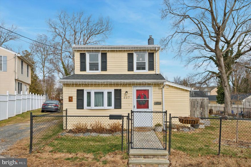 Welcome to 407 Emerald Street—a charming and thoughtfully updated 3-bedroom Colonial in the heart of Media Borough, offering a rare blend of historic character and modern improvements. Within walking distance of downtown Media, dining, shopping, and regional rail, this home delivers both convenience and comfort.

The main level features a bright and inviting living room with recessed lighting, beautiful flooring, and custom built-in shelving that functions as a dry bar and additional storage. The living room is heated by a gas stove controlled by a thermostat, adding warmth and character to the space. The updated kitchen offers ample cabinetry, gas cooking, stainless steel appliances, a newer refrigerator and dishwasher, and a replaced kitchen window that was raised for improved light and functionality. A cozy eat-in area completes the space.

A redesigned laundry nook includes a newer stackable washer and dryer, custom shelving, a fold-down work surface, and enhanced lighting—making everyday tasks both efficient and organized. A full hall bath on the main level features updated finishes and fixtures.

Upstairs, all flooring has been replaced with durable laminate, and the main staircase has been fully rebuilt. Three well-proportioned bedrooms provide flexibility for sleeping, home office, or creative use.

Recent system and exterior improvements include a new water heater, replaced main electrical panel, upgraded windows on the main level (including a front bay window), and thoughtful outdoor enhancements. Enjoy a fenced rear yard with stone-paver side patio, deck, fire pit area, raised garden beds, and a new stone-paver front walkway.

A private driveway provides off-street parking, a valuable feature in this location. A large storage shed with lofts and a garage door is included for extensive additional storage. An additional climate-controlled shed—equipped with a mini-split system—is available for $150/month, ideal for temperature-sensitive storage, hobbies, or workspace needs.

Tenant is responsible for all utilities, lawn maintenance, and snow removal.
Public utilities, baseboard heating throughout (with supplemental gas stove heating in the living room), window-unit air conditioning, and a prime Media Borough location complete this exceptional rental offering.