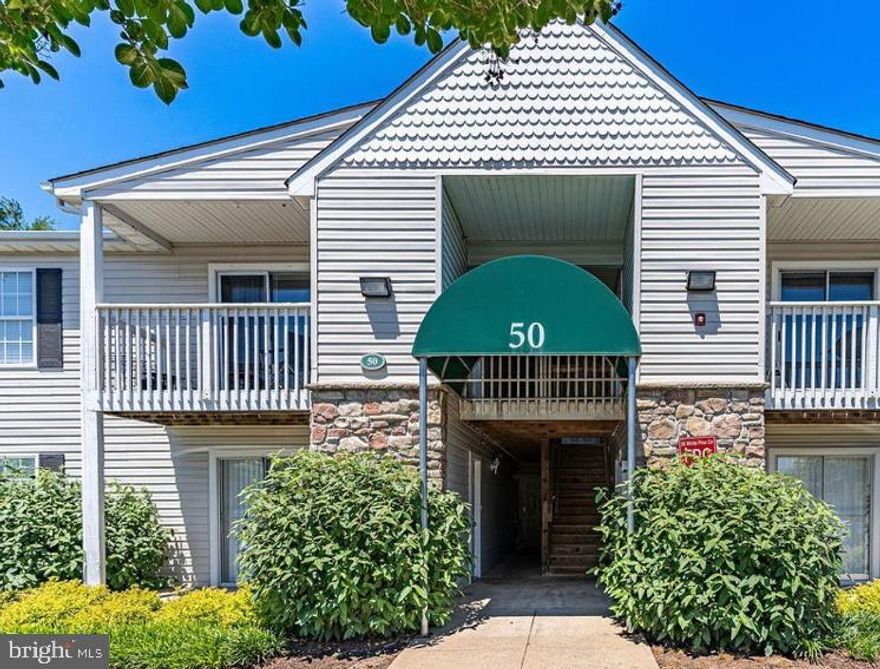 A rare find indeed! This is a lovely well maintained condo. It is bright and airy with a balcony for chairs or plants. Only 4 homes per building and not a high level building.  Private convenient setting  off route 1  and very easy access to I95 and other commuting options. This inviting 2 bedroom, 2 bathroom second floor balcony unit is nestled within a beautifully maintained garden-style building in a quiet neighborhood. Built in 2007, it features a well-thought-out layout that maximizes space and functionality. As you step inside, you'll appreciate the ease of living with washer and dryer hookups conveniently located within the unit. The community boasts a range of amenities that enhance your lifestyle, including a refreshing swimming pool, a fully-equipped fitness center, and a welcoming clubhouse perfect for gatherings and social events. Carriage Pointe at Aquia is not just a place to live; it’s a community where you can enjoy leisure and recreation right at your doorstep. You can walk to the grocery store and other shopping on sidewalks directly from this location. Whether you’re looking to unwind by the pool or stay active in the fitness center, this community has something for everyone. With exterior building maintenance included in the association fee, you can spend less time worrying about upkeep and more time enjoying your new home. This property is an excellent opportunity for those seeking a low-maintenance lifestyle in a vibrant community.  Can walk to the grocery store and other shops from here!!. Don’t miss your chance to make this delightful unit your own. Experience the warmth and comfort of Carriage Pointe at Aquia, where your new chapter awaits!