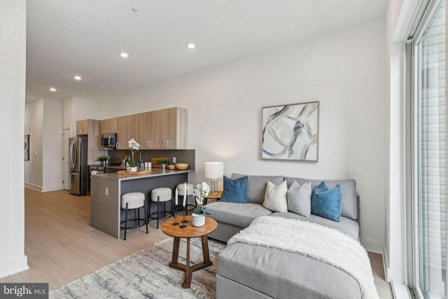 Available Now | Leasing Special: 2 Months FREE on a 17-Month Lease! Only 1st month and 1-month security deposit are due prior to move in. Gross Rent is $2,311/month - Listed Rent of $2,039/month reflects leasing special. 

Enjoy modern urban living with premium amenities at The Atrium! Each unit features a spacious and bright open floor plan with modern finishes and a sleek kitchen with energy-efficient stainless steel appliances. Unit #PH7 is a 2 Bed, 2 Bath unit located on the 5th floor of the building. Enjoy central A/C and the convenience of in-unit ThinQ washers and dryers for easy laundry days. Be walking distance to Grocery Outlet, Monarch Yoga, Shissler Rec Center, and Bamn Fitness. Nearby Towey Playground and Hancock Playground. Check out neighborhood hotspots like Stateside Vodka, Fermentery Form, Four Humours, Goldie, Kalaya, LMNO, and countless more! Please note: photos and video tours may be of a similar unit within the building; exact layouts & finishes may vary.

The Atrium Amenities & Building Features:
Secure garage parking with 18 spaces.
Butterfly Security System with personalized codes for deliveries.
Furnished lobby with a stylish, welcoming atmosphere.
Fully equipped gym featuring Star Trac equipment.
Lounge area complete with two study rooms and a bathroom.
Patio with enclosed pet run for your furry companions
Bike room and individual storage cages in the basement.
Rooftop deck offering 360-degree views of the city (to be furnished in spring).
Elevator and stair access to the roof deck.

Lease Terms:

Generally, 1st month, 12th month, and 1 month security deposit due at, or prior to, lease signing. Other terms may be required by Landlord. $55 application fee per applicant. Pets are conditional on owner's approval and may require an additional fee, if accepted. (Generally, $500/dog and $250/cat). Tenants responsible for: electricity, cable/internet, a flat monthly water fee ($40 for 1BD & $60 for 2BD), and a $35/month amenity fee which is required and includes access to roof, lounge, outdoor area, and free building wide Xfinity Wifi (including in-unit). Off-street parking is available for an additional fee: $200/month for uncovered spots and $250/month for covered spots. Landlord Requirements: Applicants to make 3x the monthly rent in verifiable net income, credit history to be considered (i.e. no active collections), no evictions within the past 4 years, and must have a verifiable rental history with on-time rental payments. Exceptions to this criteria may exist under the law and will be considered. Tenant to receive a credit upon move-in to use how they choose during the lease term. Listed rent reflects leasing special. Leasing specials are for new residents only.