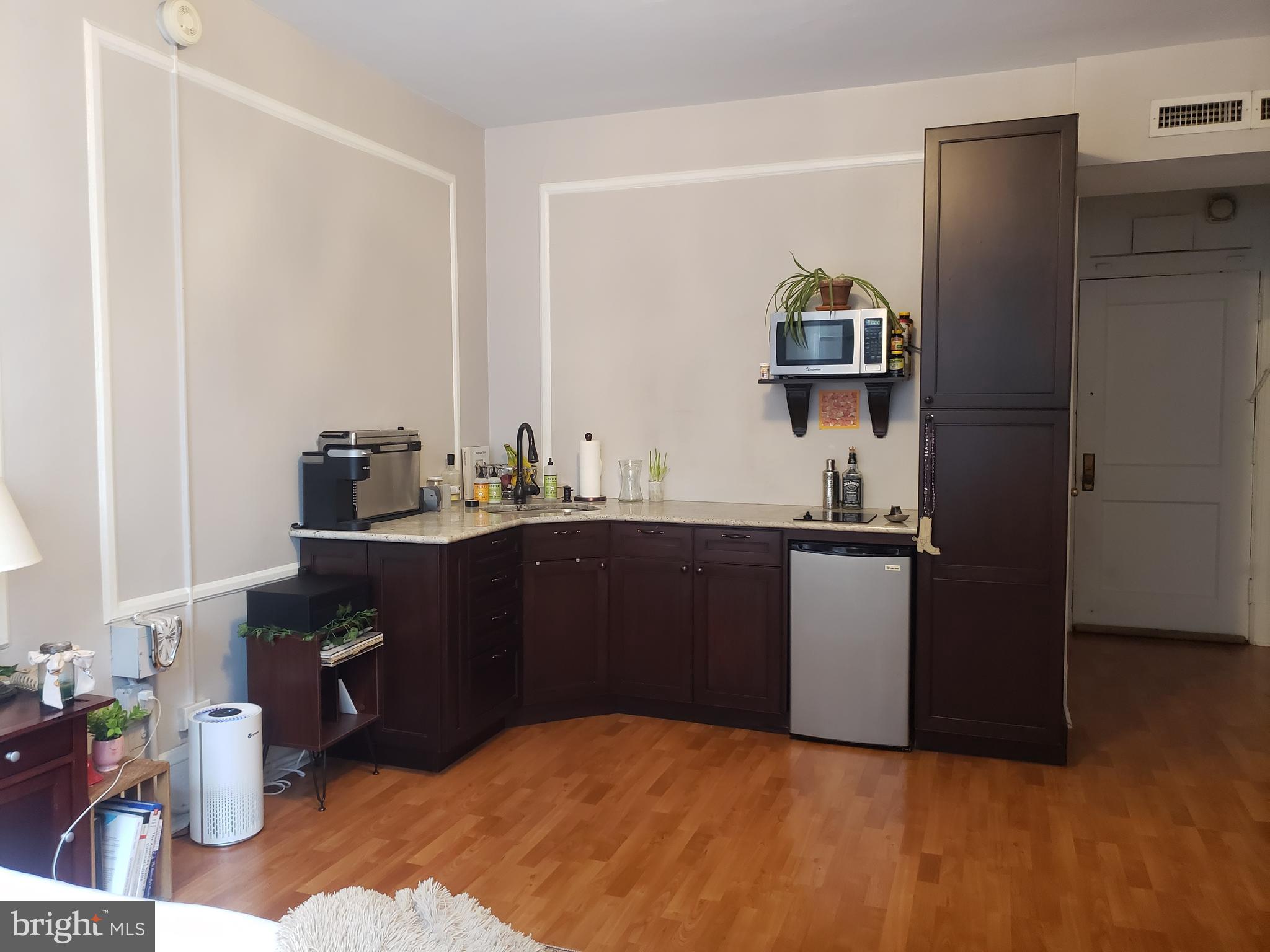 IMMEDIATE AVAILABILITY - (12 month min lease required)- RENT INCLUDES UTILITIES + INTERNET!!! ...
Pet Friendly* Studio features laminate wood flooring, two large windows with views of the Kimmel Center, a closet with mirror inlay door, in-unit air system, radiator heat and decorative ceiling light. Kitchen equipped with granite counters, microwave, lots of cabinets, stove-top burner panel and apt size stainless steel fridge. Beautifully tiled bathroom features shower stall with two shower heads, and built-in shelves, vanity with ample storage . The Arts Condo, a 16 story high-rise offers secured access entry with wheelchair accessibility, historically rich Grand Lobby, 24hr Front Desk Concierge, 24 hr. surveillance, 24hr Fitness Center, Community Room & Business terminals, FREE Wi-Fi in all common areas, bike storage (at added Fee), on-site card and mobile app operated laundry facility, 24 hour emergency maintenance and a barber shop .... Located between the hip and trendy Midtown Village district and the famed Avenue of the Arts (South Broad Street. Home to the Wilma Theater, Academy of Music and City Hall), you will be immersed in the center of it all. Walking distance to Jefferson Hospital and University, Drexel Med, Center City's fine dining, businesses, shopping, luxurious parks, theaters, and close to Temple University. PATCO, SEPTA Subway lines, and Bus right outside your door, walking distance to Suburban Station and Jefferson Station, multiple parking options (garage directly across the street), and minutes to I-95, 676, and Vine St Expressway. At The Arts Condo, there is nothing out of reach! ( *1 cat OR 1 Dog max 25lb - $350 pet fee. Requirements: one month security deposit, 1st, and last month rents, plus one-time $350 move fee, and renter's Insurance)