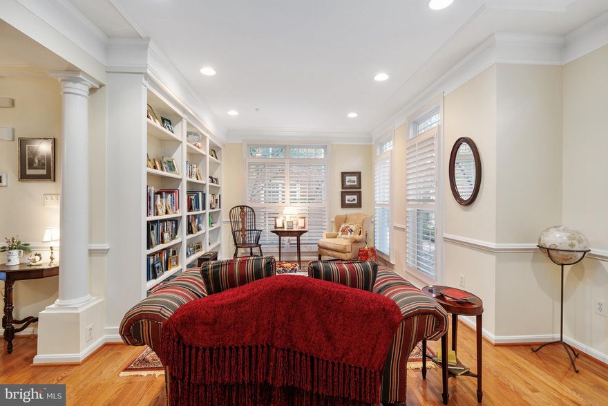 This rarely available Van Metre-built Robert Carter model in sought-after Cameron Station presents the new year’s buyer with an amazing opportunity. This light and bright end-unit brick townhome lives like a single family home, with a tree-lined border behind the home to enjoy a feeling of privacy while indoors or outdoors! There are 4 bedrooms, 3 bathrooms and 2 half bathrooms over more than 2900 square feet of space. Key highlights include: * 4 above ground levels * * a deck off the kitchen and family room and a fenced-in back courtyard * a landscaped front yard with a brick path to the front door * plentiful natural light and cross-ventilation with windows on all three sides * custom plantation blinds  * custom crown molding and built-in bookshelves * a gas fireplace * an upgraded kitchen with granite countertops, stainless steel appliances, a double oven and center-island gas cooktop * hardwood floors on the entry and main levels and stairs *a primary bedroom suite with a sunroom extension * an upgraded primary en-suite bathroom with dual sinks, soaking tub, separate shower, private water closet * 2 separate private office or flexible space options (one with a full bath) * ceramic terracotta flooring. Recent installations include a highly-efficient hot water heater (2016} and dual-zoned HVAC system (2017). Cameron Station is popular for its amenities and location in the DC region. Enjoy walking and bike paths throughout the community, a pool, a community center with gym, ball courts, shops and a shuttle to nearby Van Dorn Street metro for commuting. The neighborhood is conveniently located close to Old Town, and within a short distance of the new Alexandria Hospital complex currently being built. Convenient access to major routes, nearby the Pentagon and Ft. Belvoir. Parking includes both the garage and the space behind it, with plentiful additional guest parking on Cameron Station Boulevard less than a block away. Schedule your showing today!