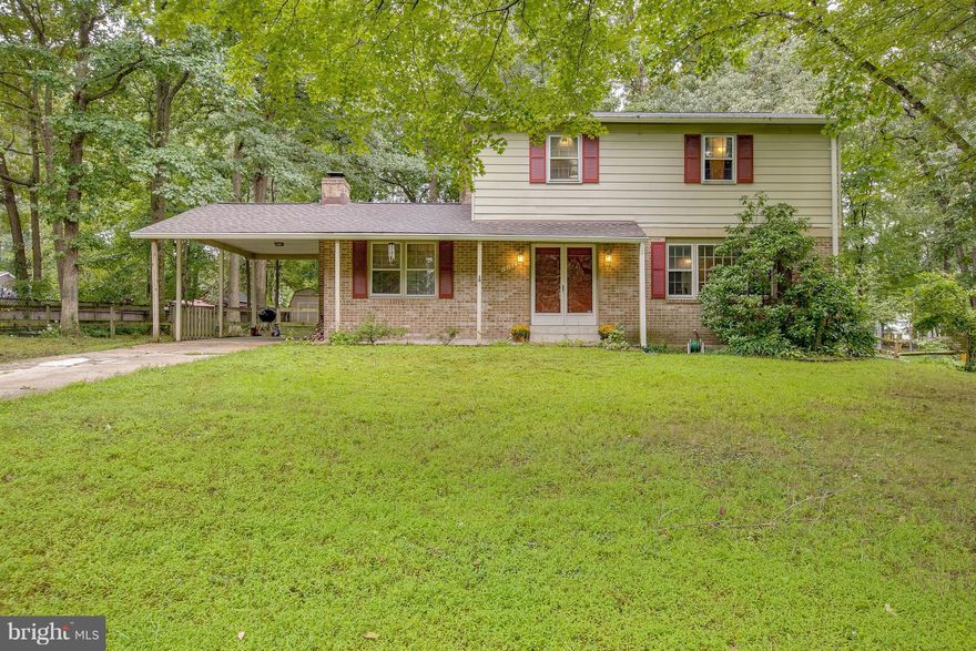 Wonderful home located in the sought after Rocky Gorge Estates situated in a park like setting!  Spacious rooms through-out with hardwood floors on both levels.   Updated kitchen w/ maple cabinets & granite counter tops, updated bathrooms and newer roof. Family room with wood burning fireplace, formal living room, dining room & partially finished basement.  Fenced rear yard & more!