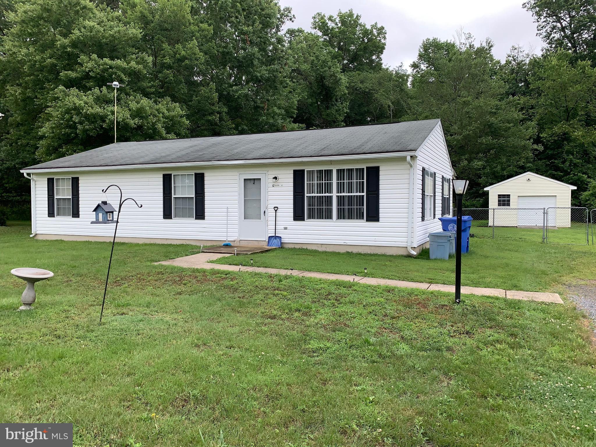 Nicely Kept 3 Bedroom 2 Bath Rambler, Spacious Rear Yard, Newer Water Heater, Off street parking and Garage in Indianhead! Call me NOW to See it!