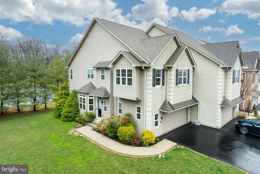 Welcome to 202 Spring Lane – A Stunning End-Unit Twin Carriage Home in a Tranquil Parkside Setting. Nestled at the end of a private road just off West Chester Pike, this beautifully maintained carriage home offers the perfect blend of peaceful living and modern convenience. Backing up to the serene and quiet Coopersmith Park, the home provides a  country-like setting just minutes from the vibrant borough of West Chester. Step inside through the side entrance and be greeted by a spacious, light-filled living area featuring gleaming hardwood floors and an open-concept layout perfect for both everyday living and entertaining. The gourmet kitchen is a chef’s dream, complete with stainless steel appliances, rich wood cabinetry, and a large center island ideal for meal prep and gathering. The adjoining breakfast room is cozy and inviting, anchored by a gas fireplace that adds warmth and charm. Enjoy your morning coffee or unwind at sunset on the composite deck overlooking the picturesque park. A convenient powder room and access to an oversized two-car garage complete the main level. Throughout the home, custom Levolor blinds add privacy and a touch of luxury. Upstairs, retreat to the expansive owner’s suite—your private sanctuary with beautiful park views, an extended dressing area, and a custom walk-in closet. The ensuite bathroom features dual granite vanities, a soaking tub, a separate shower, a linen closet, and a private water closet. Two additional bedrooms on this level offer generous space, large closets, and more custom blinds. The hall bathroom includes another double vanity, a tub/shower combo, and a separate toilet room. A spacious laundry room on this level adds convenience. Need more space? The large, unfinished basement boasts high ceilings and endless potential—perfect for creating a home gym, media room, or additional living area. Enjoy the quiet community feel with outdoor green spaces, access to park walking trails, a playground, and a pavilion. With easy access to Routes 3, 100, and 202 and just a short drive to downtown West Chester, this home truly has it all. Don’t miss your chance to call 202 Spring Lane home—schedule your private tour today!