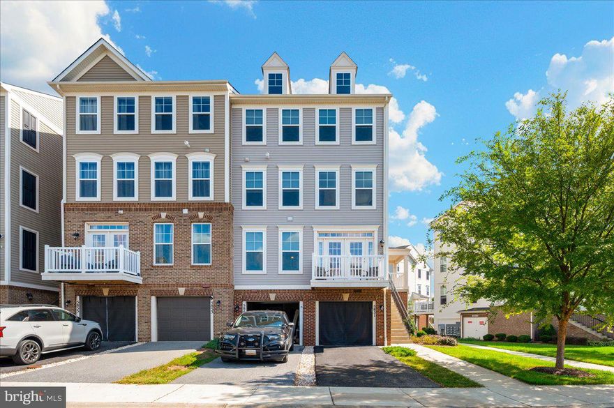 Welcome to your dream home—a stunning 3 bedroom, 2.5 bath, 4-level end-of-group townhome/condo that blends luxury finishes with thoughtful upgrades. This residence is currently being professionally painted, fitted with brand-new carpet, and refreshed with refinished hardwood floors, ensuring a crisp, like-new feel from the moment you step inside.

The gourmet kitchen is the heart of the home, featuring stainless steel appliances, gas cooking, custom cabinetry, granite countertops, and a spacious bar-top eating area. Natural light pours through the extra end-unit windows, creating a bright, open layout that flows seamlessly onto the balcony. Upstairs, the impressive primary suite includes a tray ceiling, large walk-in closet, and spa-inspired bathroom with soaking tub and tiled shower. With multiple bedroom levels, this home offers the perfect balance of comfort, privacy, and function.

But the showpiece? The garage conversion into a one-of-a-kind entertainment retreat. Designed as a full bar with seating, multiple mounted TVs, refrigerators, and its own heating source, this finished space is a true extension of the home—perfect for game days, gatherings, or simply unwinding in style.

Located in a vibrant community with fantastic amenities and unbeatable commuter access, this home is more than just a place to live—it’s a lifestyle upgrade.