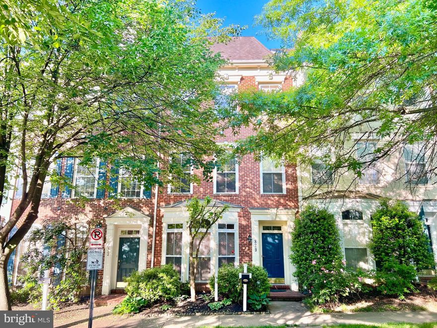 Gorgeous, spacious, and full of beautiful updates. Brazilian cherry floors flow from the entry foyer through a main level with generous rooms and abundant natural light. The large living room features upgraded moldings and a big bay window and adjoins the generous dining room. The chef’s kitchen sparkles with granite countertops, stainless steel appliances, and white cabinetry. The family room features a gas burning fireplace, Palladian windows, and egress to the pretty patio and garage. This level also includes a lovely powder room and a convenient coat closet.

Upstairs, the luxury primary suite’s special features include two walk-in closets and an updated en-suite full bath with granite countertops, custom cabinets with soft-close drawers, a glass-enclosed shower with custom tile, and decorator lighting and fixtures. The separate landing area is large and bright and offers the perfect spot for a home office. This level also includes the laundry room and linen closet.

The second upper level has a versatile family room area plus two big bedrooms, each with a roomy walk-in closet and private vanity area, and the second full bath.

Outside, the pretty patio offers a perfect spot to relax and entertain and the lovely, low-maintenance landscaping provides the perfect amount of garden space. The two-car garage has a convenient single-bay plus pull down access to attic storage. Recent updates include the HVAC (2020), water heater (2023), and the washer and dryer (2023).

Together with a fabulous location facing a picturesque park and with quick access to the countless shopping, dining, recreation, and entertainment options this sought-after and award-winning community has to offer, this home has it all!