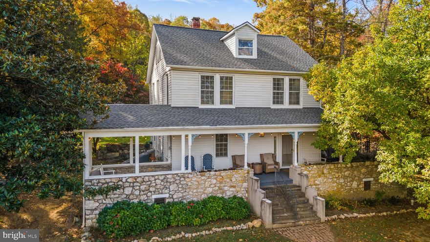 Tucked along scenic Annandale Road, just behind Mount St. Mary’s University, this east-facing Emmitsburg property sits on over 3 private acres with its own fishing pond and mature trees. This lovingly cared for 1920 home carries a sense of history while offering the comfort and functionality that fits today’s lifestyle.

Outside, you’ll find a gorgeous, expansive wrap-around porch with a stone wall, perfect for gathering, dining, or unwinding while overlooking the grounds. The private fishing pond adds a special element that is rarely found in this unique setting. The backyard features a beautiful stone patio, a great spot for the grill, and convenient to the kitchen with easy access from the driveway.

The land itself offers room to garden, explore, or simply take in the surroundings, and includes a custom chicken coop with an attached duck house that adds to the charm and usability of the property. Opportunities like this, where you have space, privacy, and usable land, are increasingly hard to find.

Inside, you’ll find 4 bedrooms and 2.5 baths. Natural light fills the home, and the surrounding landscape creates a peaceful backdrop. The kitchen has been updated with newer appliances (2022), including a refrigerator, dishwasher, microwave, and double oven, along with a new sink and faucet (2025). The layout is comfortable and practical, with spaces that work well for everyday living.

The second floor offers three bedrooms, a hall bath, and a flexible office or sitting room that leads to the primary suite. The fully finished attic serves as a private primary retreat, complete with its own full bath and beautiful 360-degree views of the property.

Several important updates have already been completed. These include a new roof, downspouts, and gutter guards (2024), well pump replacement (2022), sump pump (2021), pressure tank (2025), and a new UV water treatment system (2026).

For added peace of mind, the sellers recently tested the well water (March 2026), and the septic system was inspected and pumped (March 2026), receipts available.

Located just minutes from downtown Emmitsburg, this special home offers a balance of privacy and convenience that fits the way you want to live.