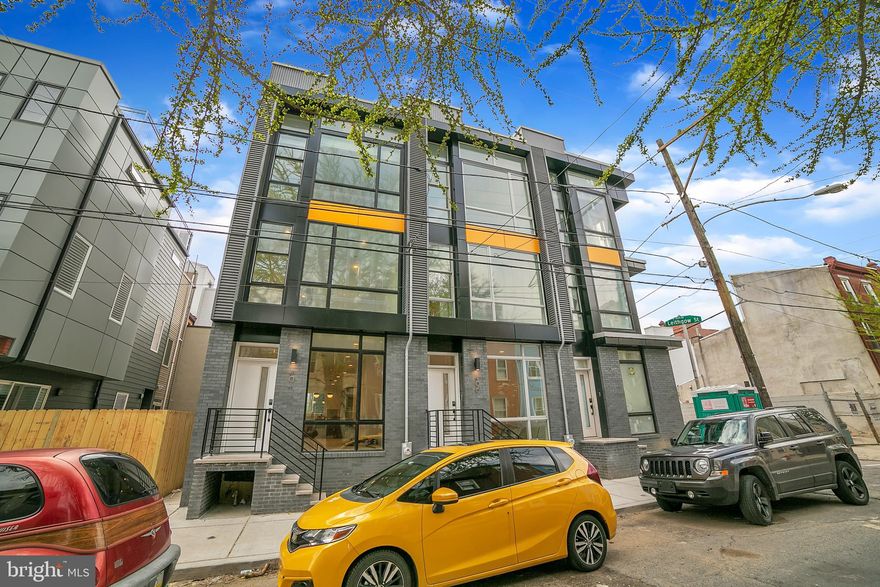 Welcome home to Urban View! One of the premier new construction projects in Philadelphia, the project features four high-end townhomes and two top-of-the line condominiums. 1239 N Leithgow St. is one of the four townhomes in this development being built by one of Philadelphia's premier builders, Tester Construction Group. Copy and paste the following link in your browser for virtual tour: https://mls.homejab.com/property/view/404-w-thompson-st-philadelphia-pa-19122-usa-56833 This luxurious townhome will feature 9-foot+ ceilings and oak hardwood flooring throughout! Step inside the entry way to your spacious living room, which gives way into the formal dining area. Behind the dining area is your luxury kitchen which features white quartz counter-tops, seating at a peninsula, a pull-out pantry, wood-grain shaker cabinetry, gas cooking fuel, a custom tiled backsplash, stainless steel appliances, and matte black hardware! The second floor features a hallway bathroom with custom tile throughout. The second floor also houses the laundry room which will offer a front-loading washer and dryer (gas). There are two very large bedrooms on the second floor as well with plenty of closet space! The third floor boasts the gigantic owner's suite with cathedral ceilings! The suite features an approximately 7-foot by 7-foot walk in closet with sliding door. The bathroom is over 13 feet long and about 7 feet wide! Just the shower itself is 3 and a half feet by 7 feet! The shower offers a large bench area as well as beautiful custom tiling! A giant soaking tub also accompanies the over-sized bathroom with dual vanities! Take the stairs from your master suite to your private roof-top deck and enjoy the 4th of July fireworks and amazing city views with family and friends! The basement level features a full bathroom and offers a whole floor of extra living space.  There is also plenty of room for extra storage down there! All bathrooms will have custom hex and standard tiling, Delta faucets, ceasarstone counter-tops, and porcelain tile flooring. Some special features include video doorbell systems, keyless entry, large Pella windows, matte black wall sconces, matte black door hardware, with brick and aluminum composite exteriors. The location of these units cannot be beat whether you rely on public transit or drive to work. Not only are these properties just a short 10 minute walk from the Girard Station on the Market-Frankford line, but they're also steps away from the trolley and have plentiful parking on the nearby streets. Enjoy all of the happening that both Fishtown and Northern Liberties have to offer, being just a short walk away from Pizzeria Beddia, WM Muhlerin's, Helm, ReAnimator Coffee, One Shot Cafe, El Camino, and much more! Easy access to I95 and I676 as well!