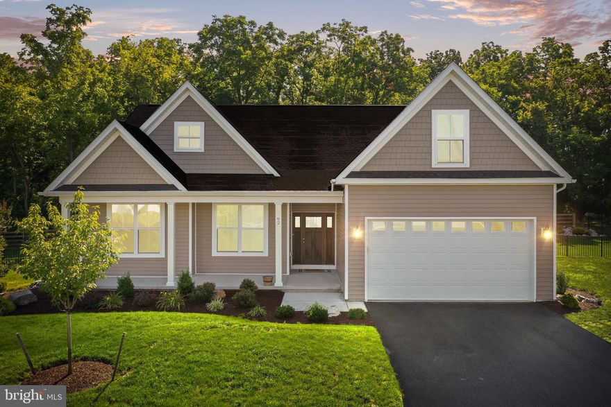 Located in Jefferson County's Quail Ridge Subdivision, this home is a must see.  Not even 2 years old, this  Rancher has 3 bedrooms with 2 full bathrooms on the main floor and an additional 4th bedroom upstairs with its own private full bathroom. Walking through the front door you enter into a warm welcoming entrance which leads to the large family room, with vaulted ceiling, having an open floor concept, allowing you to spend time with family and friends while prepping dinner in your spacious kitchen. The eat-in kitchen features a large working island that borders the family room and a dining area to the side overlooking the backyard.  The large front porch allows you the opportunity to welcome family and guests, with space enough to sit in an outdoor rocker and wave at neighbors walking by.  This home features a full unfinished basement with rough in for an additional full bath-room, and basement space enough to add an extra bedroom, game room or home theater; a large door provides accessibility to the side of the backyard.  The beautifully landscape home has been professionally sodded and a backyard that is fully fenced.   The large back patio accessible from the kitchen/living-room is the perfect place for outdoor entertaining or a quiet moment with a cup of coffee in the morning or a glass of wine in the evening. The primary bedroom located off the family room has two closets, a smaller closet located in the bedroom and a large walk-in closet accessible through the primary bathroom. The primary bathroom has both a walk in shower, a bathtub with double-sinks and ample cabinet and drawer space. The extra bedrooms located on the opposite side of the house from the primary bedroom are perfect for family and visiting guests and share the second full bathroom located on the first level.
The home is centrally located, in the West Virginia eastern panhandle, between Martinsburg, Charles Town, Inwood and Shepherdstown WV; easy access to shopping, restaurants, and outdoor entertainment; only 34 minutes to Hagerstown, MD; 32 minutes to Winchester, VA and 50 minutes to Leesburg, VA.