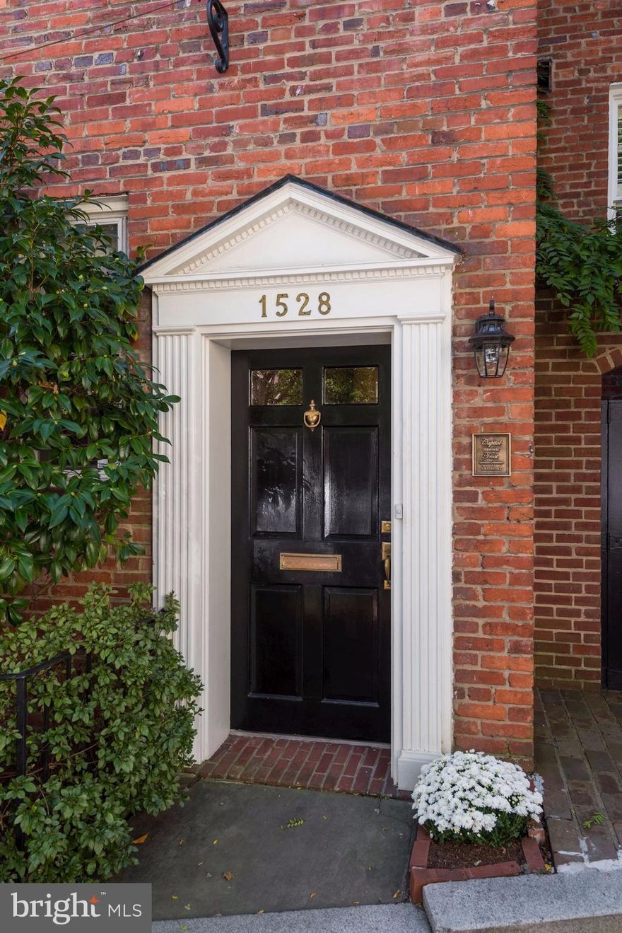 Exquisite 3BR/4.5BA Federal that was JFK's first home in Georgetown when he came to Congress in 1947! Meticulously maintained a w/ a gourmet Kitchen w/ high grade appliances, h/w floors, exquisite cabinetry, cocktail wall, and beautiful private garden!