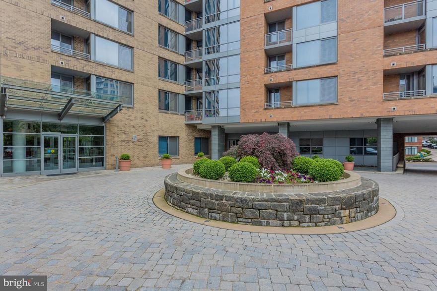 Contemporary Elegance...Walk to Everything..walk score 95!!  The Odyssey is in a class by itself. 24-hr front desk, gym,  garage parking, rooftop pool and deck with DC views.  Walk to Metro, shops and restaurants. Beautiful condo w/ open floor plan, neutral carpet, fresh paint (March '18), spacious balcony, garage parking, sleek black appliances, walk in closet..elegance and ease a perfect combo!