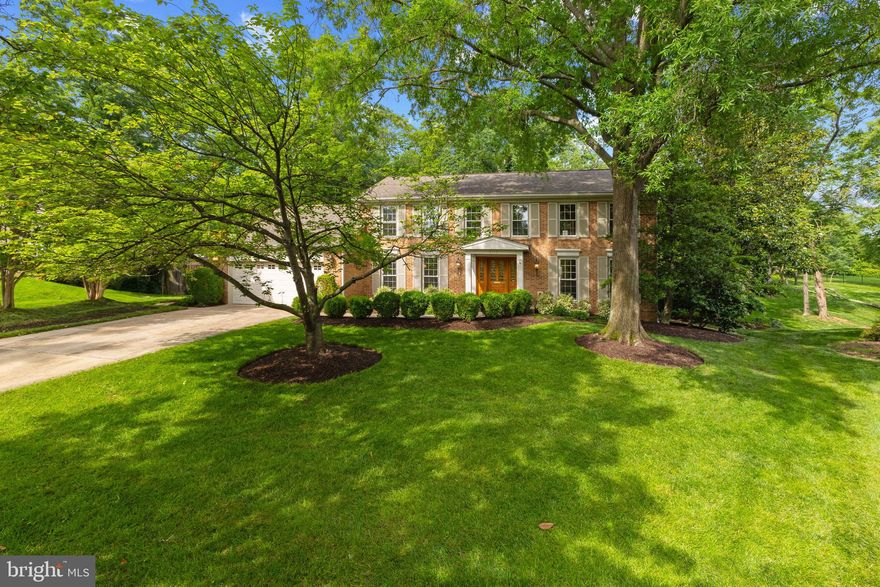 Sited on one of the largest and most private lots in all of Seminary Ridge, this extraordinary estate residence is truly one of a kind!  Offering over 6,700 square feet of finished living space, including a dramatic custom two-level addition, making it unlike any other home in the neighborhood.  A sun-drenched glass breezeway takes you from the main portion of the home up to the stunning garden and great rooms - which are the heart of this home. The sprawling great room is a true showpiece with 17.5-foot vaulted ceilings, a floor-to-ceiling stone fireplace, custom built-ins, a wet bar, and four sets of French doors that open seamlessly to the resort-style backyard and pool. Transom windows bathe the room in natural light, while the custom millwork adds timeless sophistication. This unique space allows both the ability to host large events and holidays or a cozy space to curl up by the fire for quiet nights in! Adjacent, is the garden room which has a wall of windows inviting serene mornings or evening cocktails while overlooking the heated in-ground pool  (complete with separate baby pool and hot tub!) — all set amidst extensive hardscaping and manicured landscaping for a serene backyard oasis. The charming and convenient pool house features a wet bar, a full bath and changing area, utility room, and covered lounge area overlooking the pool, making this the ultimate summer escape!  Enjoy ultimate privacy with no neighbors directly behind the home, a second private patio completely separate from the pool area and closer to the kitchen, and flat green space at the back of the yard! The original part of the home features a flexible floor plan with many formal and informal spaces and oversized windows inviting the outdoors in. The upper level boasts five spacious bedrooms, a dedicated office or sixth bedroom, and three full bathrooms while the lower level of the main house features a rec room with brand new carpet, a half bath and ample storage space. The finished lower level of the addition offers incredible versatility — ideal for a home gym, workshop, creative studio, expansive storage space, or a rainy-day kids’ retreat. Conveniently access the main level mud room/laundry room from the 2-car garage. 3 wood-burning fireplaces, 3 zone HVAC, Generator, In-ground sprinkler system, Neutral paint throughout, Beautifully refinished hardwood floors and more!  Grand in scale and unmatched in privacy, this is an incredibly unique opportunity to own an estate-calibre property on half an acre in Seminary Ridge!!