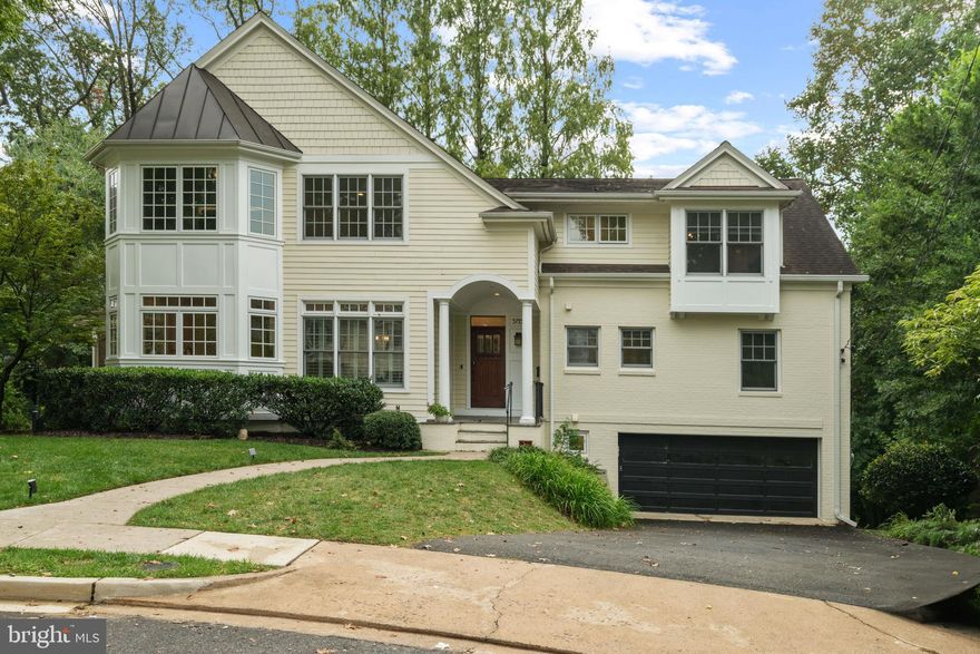 3722 N. Woodrow Street delivers rare scale, privacy, and design in Country Club Hills, one of North Arlington’s most prestigious neighborhoods. Perched on a quiet cul-de-sac this Craftsman-inspired home, completely reimagined in a 2008 renovation, offers almost 5,000 finished square feet of light-filled space on a .41-acre fenced lot, one of the largest lots in the neighborhood, with an in-ground, solar-heated pool and ample yard space. This exceptional residence offers 6 bedroom + office, 5 bathrooms, loft space, and a walk out basement. Main level bedrooms provide flexibility for multi-generational living or work from home space. Open concept living on the rest of the main floor includes a large dining room with plantation shutters, a bright and spacious kitchen with a peninsula bar area and a built-in desk. The great room features hardwood floors, a wood burning fireplace, custom built-ins and an amazing bank of windows overlooking the backyard. A sunroom and deck extend the living area outdoors. Upstairs, you’ll find hardwood floors throughout the upper level. The primary suite is a true retreat complete with box ceiling, a sitting area, a custom walk-in closet and a spa style bath with dual vanities, soaking tub, shower and water closet. 3 additional bedrooms and a renovated hall bath complete this level along with a versatile loft space perfect for a playroom, homework space,reading nook, or a possible 5th bedroom. The current owners have converted one of the bedrooms into a second floor laundry room with two sets of stackable washers and dryers. The walk out basement features another wood burning fireplace, a large rec area, additional laundry room, storage room, access to the 2 car oversized garage and a luxurious new bathroom with a two person dual head shower. You’ll also find a lovely screened in porch that leads to your outdoor oasis and heated pool. The yard is ideal for gardening, games, or entertaining. The residents enjoy neighborhood block parties and an annual 4th of July parade. Highly rated Jamestown, Williamsburg and Yorktown schools. Close to Washington Golf and Country Club, easy access to Clarendon, Tysons or DC. Do not miss your opportunity to live in this rare gem!