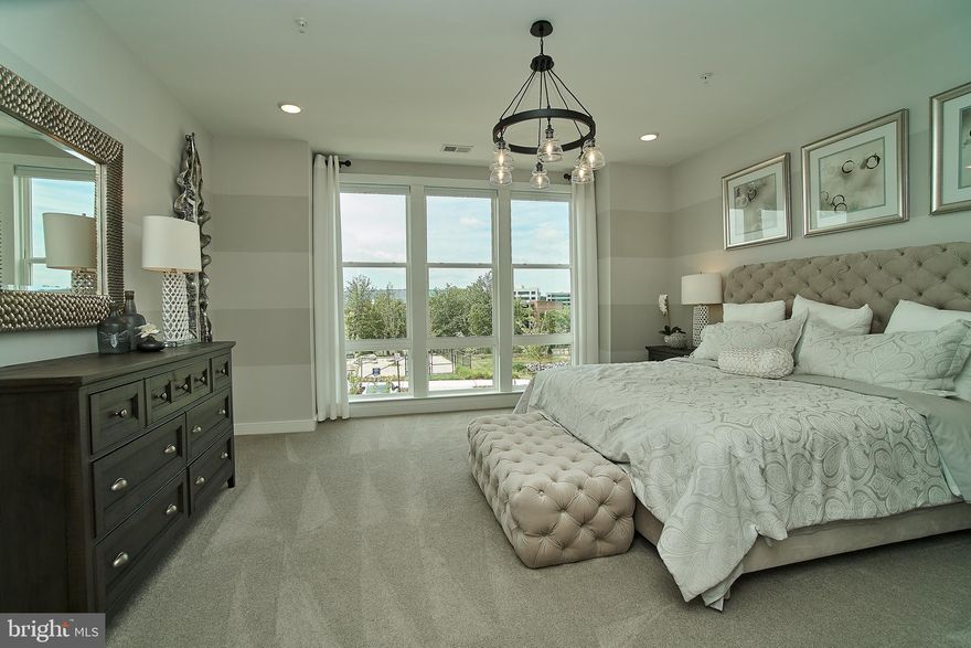 STUNNING brand new, never lived in, 2 level condo in a great Herndon location!! Be the first to enjoy this great home! Home overlooks the lush, fabulous Arrowbrook park and ball fields! Best location in the community! Trendy interiors, open concept living areas, gourmet Kitchen with quartz countertops, upgraded cabinetry, subway tile backsplash, stainless steel appliances and more! The upper level features a fantastic master bedroom that overlooks the park! En-suite bath with tile floors, granite counter tops! Walk-in closet; 2 secondary bedrooms are spacious, plus an additional full bath; Laundry on upper level; Location is unbeatable! Walk to Herndon clock tower and all the restaurants, stores, bars etc! Quick hop to 267! Reston, Tysons are just minutes away! New Metro stop will be just a few minutes walk! Come see this home today! Pictures are of the model home. The actual unit has the same floor plan. MOVE-IN TODAY!! Small pets will be considered.