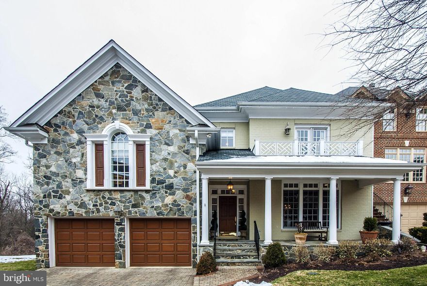 Character & charm abound in this end-unit townhome conveniently located in the private community of Chain Bridge Terrace. Complete w/ elevator, spacious & open main level w/ gourmet kitchen, light-filled family room w/ built-ins, formal living & dining rooms, expansive master suite w/ luxurious bath, walk-out lower level w/ theater room, & a two-car garage. Fully fenced rear yard. A MUST SEE!!!