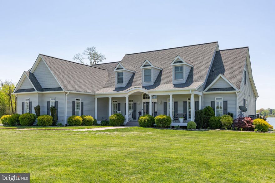 Welcome to your own piece of paradise! This lovely home has a great open floor plan with several large windows to take in the serene river views and let in tons of natural sunlight, especially on the main floor in the kitchen, living room and primary bedroom.  There's an expansive composite deck and screened-in porch on the back of the home where you can sip your morning coffee and watch the sun rise over the river.  This property offers a level, fenced-in backyard with an easy walk to your private pier that includes a covered boat lift and 2 jet ski lifts.  Schedule your tour today to see this gorgeous property in person!