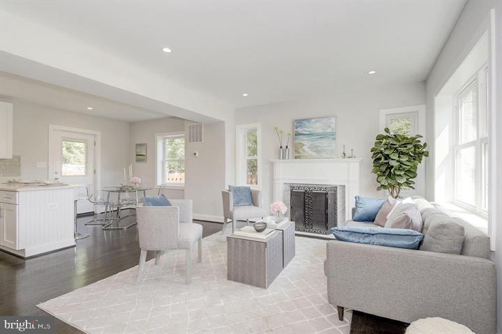 This updated 4 bedroom and 3 bath brick home is located in a prime North Arlington neighborhood!
As you enter, you will encounter beautiful hardwood flooring in the living room and gourmet kitchen that features stainless steel appliances, white cabinets and quartz countertops. Leading out of the kitchen there is a spacious deck for entertaining and a large landscaped backyard. Leading upstairs you'll find the spacious primary bedroom with plenty of light, storage and en-suite master bathroom. In addition, there are two spacious bedrooms with plenty of light and a bathroom on the second level. The home also includes a finished lower level with a bathroom and has plenty of space for an office, entertainment room or home gym. This home is in close proximity to the Ballston Metro, nearby parks and plenty of entertainment and dining options in the Ballston corridor! No pets allowed. The home comes furnished at $7,500 or unfurnished at $6,500.