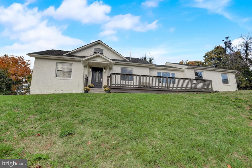 Gorgeously renovated ranch style home with tons of charm! Beautiful hardwood flooring throughout, living room with tons of natural light and lovely French doors, updated kitchen with granite countertops and new stainless steel appliances. Six bedrooms provide ample space with flexibility for an office, guest room or even crafts. All 3 bathrooms are modernized with stylish fixtures and elegant tile work. The half acre lot is rich with possibility and potential. Everything is brand new - roof, plumbing, HVAC, water heater, electric and ductwork. Schedule your showing of this exquisite home today!