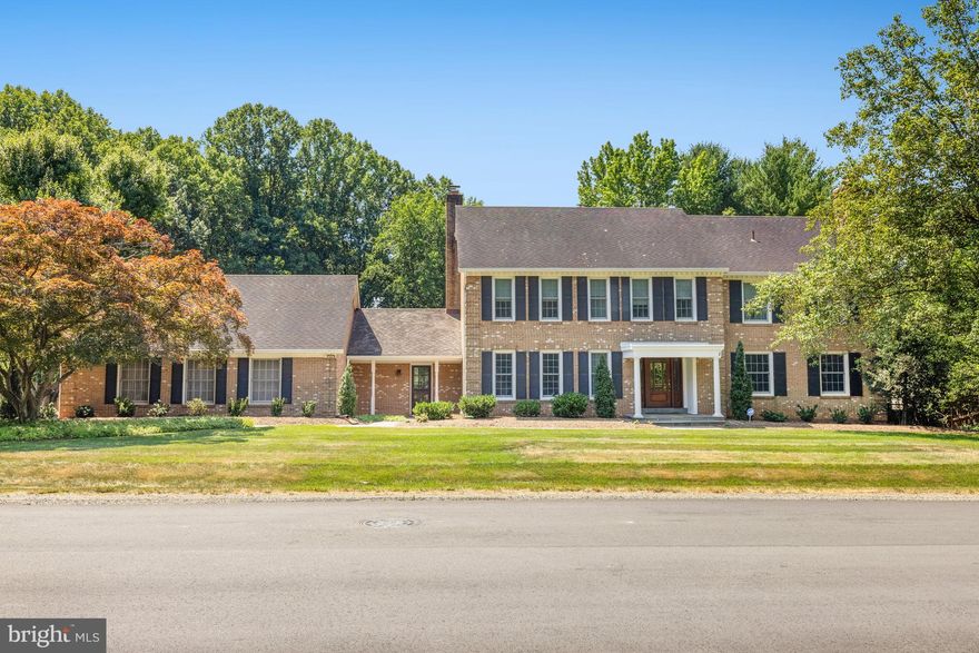 Welcome to this inviting classic colonial home offering 5-bedroom, 4.5-bathroom on 1.3 acres and boasting three beautifully finished levels. Gleaming hardwood floors grace the main level, setting a tone of elegance and warmth throughout. The spacious living areas include two cozy wood-burning fireplaces, perfect for gatherings in the living room and family room. The heart of this home is a large screened-in veranda that spans the entire back side, offering a serene space to enjoy the picturesque backyard, which backs to a lush, wooded area. This outdoor oasis features a sparkling inground swimming pool, providing the ideal spot for relaxation and entertainment. Convenience is key with a side-load three-car garage and a prime location near Tysons, Route 7, and Wolf Trap. This home offers an incredible opportunity to create your dream living space in a sought-after neighborhood. Come and see the potential that awaits in this charming and versatile property.