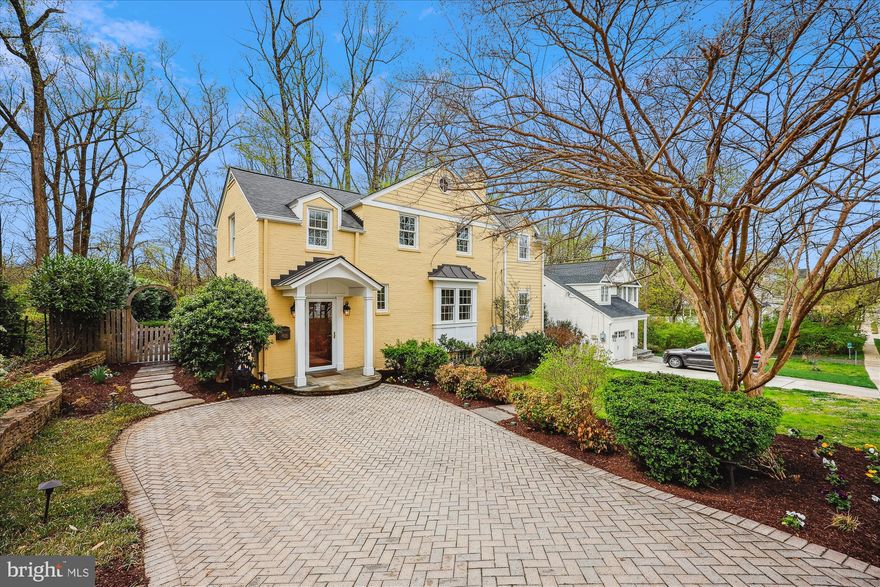OPEN HOUSE CANCELLED. Renovated with artistic vision and designed for modern living, this exceptional home offers timeless curb appeal and every amenity for comfort, entertaining, and recreation. From the herringbone-patterned driveway to the inviting front portico, the classic brick and siding exterior sets the stage for a thoughtfully designed interior.

The home opens to a custom entry/mudroom—every organized household’s dream—featuring floor-to-ceiling stacked shelving, charming window seats, built-in drawers, and hooks. Finished with slate flooring and a convenient powder room, this stylish and functional space also provides access to the backyard, setting the tone for the home’s seamless blend of luxury and practicality.

A landing leads to the living room, highlighted by one of the home’s three fireplaces. The stunning kitchen is a chef’s dream, featuring rich, polished cabinetry with crown molding, rounded open shelving, and glass-front doors—perfect for decorative displays. Ample storage and expansive counter space make this kitchen as functional as it is beautiful. A pass-through opens to the dining area and an adjacent light-filled home office or craft room—an ideal flex space adaptable to various needs.

Glass pocket doors connect the kitchen to a warm and inviting family room with floor-to-ceiling windows, custom built-ins, and a gas fireplace. Just beyond, an expansive screened-in porch boasts a brick wood-burning fireplace, slate flooring, and a beadboard ceiling, creating a serene, all-season retreat. The porch flows effortlessly into a flagstone patio, a fully fenced backyard, a spacious detached shed, and even a basketball court for friendly competition.

Upstairs, three spacious bedrooms and two full baths await. The primary suite includes two closets and a beautifully renovated ensuite bath with a marble-topped vanity, a separate shower, and a dramatic vaulted ceiling. The additional bedrooms are equally inviting, including one with a stylish board-and-batten accent wall. The hall bath features a relaxing soaking tub.

The lower level continues the theme of easy living with durable luxury vinyl flooring, a laundry room, a full bath, and a large insulated storage room with power and lighting. Every detail has been thoughtfully designed for modern convenience, from Elfa closet systems to a 200-amp heavy-up electrical system and an outdoor car charging port.

Located in the heart of Parkwood, with its beautiful tree-lined streets and sidewalks, this home backs to the park and the biking and hiking trails into Rock Creek Park. It is moments from the vibrant Kensington town center, has easy access to commuting routes, and is located near excellent schools. For the buyer seeking their perfect forever home, this checks every box!