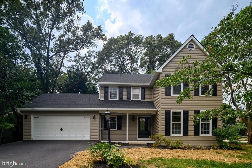The Ideal Family Home in Shipley’s Choice — Updated & Ready for You

Welcome to this completely renovated colonial in the popular Shipley's Choice neighborhood of Millersville. Built in 1983, this home has been transformed with a fresh, open layout that makes it feel bright and spacious from the moment you walk in. The living room is full of natural light and features a beautiful marble-front electric fireplace. A cozy bow window highlights the dining area, right next to the updated kitchen with crisp white cabinets, a deep farmhouse sink, and a sleek Samsung fridge with changeable front panels. The family room has another fireplace and opens to a great deck—perfect for relaxing or entertaining. The garage is finished with epoxy floors and even includes a private office with tall ceilings, a big storage closet, and French doors. Upstairs, you’ll find four bedrooms, including a primary suite with a walk-in closet, dressing area, and a gorgeous bathroom with a custom tile, pebble-floor walk-in shower. There’s also a full hall bathroom with a tub and shower, and the third bedroom has its own attached bathroom with a walk-in shower. The finished lower level gives you even more space, with a rec room split into two areas—one for movie nights and the other for games or hanging out. Plus, there’s a full bathroom with a walk-in shower and another office with French doors and tons of storage. This home is truly move-in ready and has plenty of space for work, play, and everything in between!