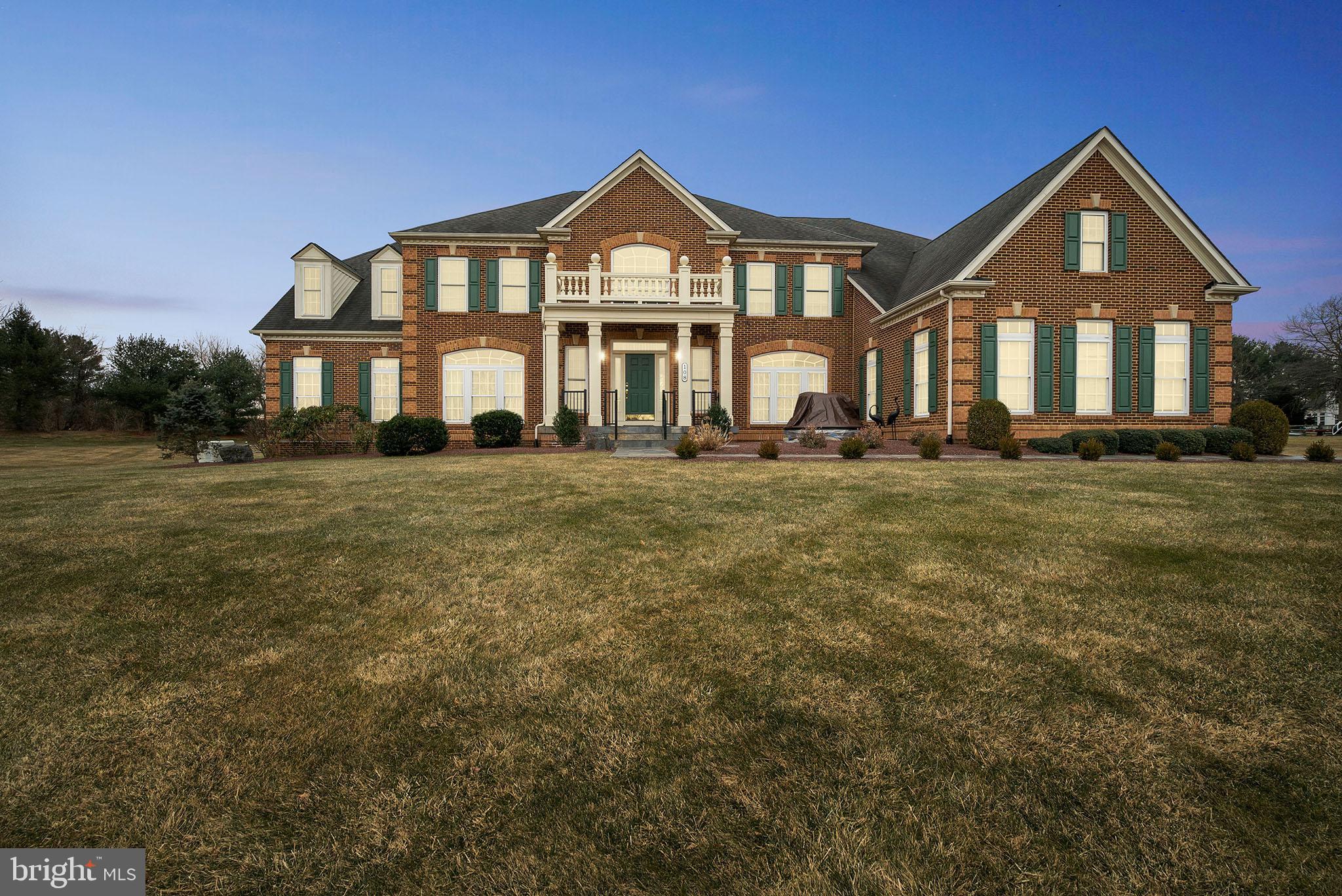 Welcome to this magnificent 6-bedroom, 6.5 bathroom home in Newtown, PA! This gorgeous and well-maintained home spans 6,133 SF over 2 floors (as well as a 3,000 SF fully finished basement!) and is full of amazing features such as a heated pool and 12-person movie theater! Enter directly into the grand 2-story foyer on the main level of the home, complete with sky-high ceilings and wainscotting. Beautiful hardwood flooring and crown molding are throughout this level. To the left is a large formal sitting room which leads into an even more spacious bright and sunny family room. The formal dining room is expansive, with a floor to ceiling arched window and panel molding throughout. In the center of the main level is the huge 2-story great room/family room, with soaring high ceilings, huge arched window, gas insert fireplace, and beautiful built-in wooden shelving. The gourmet eat-in kitchen is equally as stunning, boasting a tall brick archway (and brick throughout the main kitchen area), electric fireplace facing the huge dining area, large stainless steel appliances, skylight, a central island, and butlers pantry. Right off of the kitchen is a breakfast room surrounded by floor to ceiling windows filling the space with great natural light. Also on this level is a spacious office/study, laundry room, half bathroom, first bedroom, and first full bathroom featuring a glass-enclosed stall shower and wainscotting. Up the curved double staircase on the 2nd level of the home you will find the huge master bedroom containing a large, connected sitting room, skylight, and 2 walk-in closets! The ensuite master bathroom is contains a walk through shower surrounding the large soaking tub. There are an additional four bedrooms on this level - all sizable with wall to wall carpeting. Three of the bedrooms also feature walk-in closets and ensuite full bathrooms! Rounding out the interior of the home is a spectacular fully finished basement. This lower level includes a full bar, a 12-seat theater with theater lighting, additional den/family rooms, fitness room, and full bathroom with gorgeous stone glass-enclosed stall shower. Double doors in the lower level lead out into the backyard patio which is complete with a heated swimming pool, hot tub, koi pond, cabana, and fire pit! The property is surrounded by scenic grounds and beautiful well-kept landscaping. Additional features of the home include keyless entries, R.O. Unit, sump pump battery backups, natural gas standby house generator, and water softener. 108 Parsons Ln is ideally situated in the highly-rated Council Rock School district, and close to major highways as well as the dining and shops of Historic Newtown. This home has everything you need and much more! Don't miss out; schedule your appointment today!