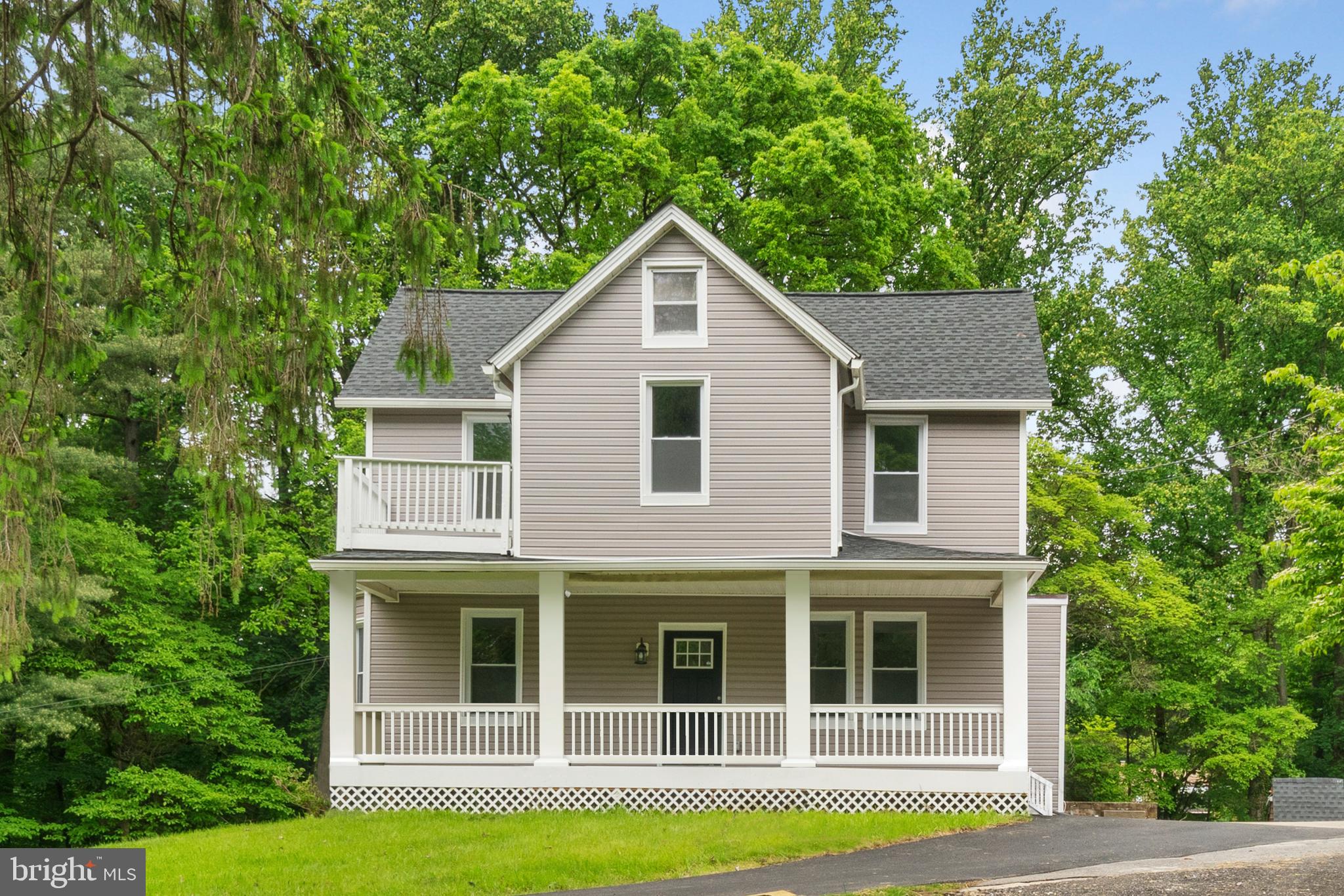 **Open House for 8/3 Canceled
Step into a realm of timeless charm and refined elegance in this restored farmhouse. Fully renovated in 2023 boasting over 2,500 square feet of curated living space, every corner of this residence exudes sophistication and grace. 4 spacious bedrooms with 3.5 bathrooms including 3 ensuite bedrooms. The primary bedroom is on the main floor creating a private owners retreat.
You're greeted by the warm embrace of gleaming hardwood floors that extend throughout the home. The inviting living room beckons with its coffered ceiling, offering a cozy retreat adorned with a touch of grandeur. Indulge your culinary senses in the gourmet kitchen, a haven of culinary creativity and refined taste. Quartz countertops, and top-of-the-line stainless steel appliances, it is a space where culinary aspirations take flight. The kitchen opens up to the dining area and large family room. A large mud room off of the side of the home includes the conveniently located laundry room.
Ascending to the upper level reveals three additional bedrooms, two full baths, and a den. Step out onto the second-level deck from the den to enjoy the beauty of the surrounding landscape, a picturesque backdrop to moments of quiet reflection.
Set on a peaceful dead-end road, tranquility reigns here, making it an ideal oasis for those seeking a serene retreat from the hustle and bustle of daily life. Step outside, and you'll find yourself within walking distance of the charming boutiques and delectable restaurants that Stevenson Village has to offer. This seamless fusion of convenience and small-town charm is a rare find. Commute with ease, as you're just minutes away from Interstate 695, turning your daily drive into a commuter's dream. Don't miss the chance to make this home your own.