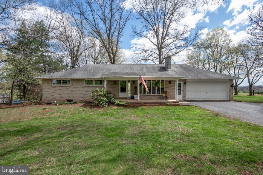 Absolutely Beautiful Brick Rancher!!!! This Immaculate home is situated on 1 ACRE of FLAT LAND. When you walk into this BEAUTY, you are greeted by a nice size foyer, next you will see the living room. The living room has light oak laminate flooring, a beautiful white wood fireplace, and a big bay window, which allows a beautiful natural light into the space. Attached to the living room, is the formal dining room and kitchen. This space has laminated flooring, updated lighting, open shelving, gas oven, and stainless-steel appliances. Right off the dining room is the laundry area. There is a full bathroom with ceramic tile and updated bathroom fixtures. There are 3 bedrooms. The master bedroom has a ceiling fan, carpet, and a half bath. The other 2 bedrooms have carpeting and big closets that provide a good amount of storage space. There is a partially finished basement with an office and family space. The basement also has a French drain, and the unfinished space would be great for a workshop. There is a back deck space that is concrete and has an elegant black railing, overlooking a large farm of about 80 acres. This gorgeous home is move in ready and is situated on 1 acre of flat land with a milk production farm attached in the back. CALL TODAY to schedule your Viewing of this AMAZING ONE FLOOR LIVING HOME!