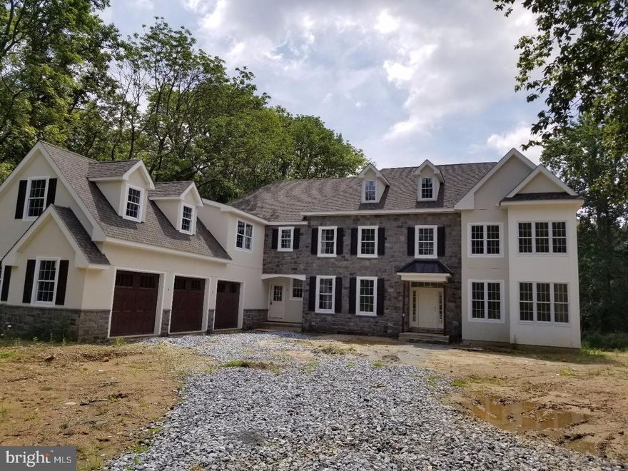 Welcome to your brand new home.  The foyer of this center hall colonial features arched doorways into the living room and dining room with keystones and corner blocks in the trim work.  The foyer looks out over the deck into the wooded back yard. The kitchen, breakfast area and family room are all one space keeping everyone in the family connected.  The kitchen includes an island for seating, a separate pantry room, as well as nearby family office space with built in cabinetry.  Upstairs the master bedroom has two walk in closets and a tray ceiling.  The master bath features a freestanding tub and large shower area.  Down the hall two large bedrooms share a jack and jill bathroom and the other two large bedrooms have private bathrooms.  The laundry is upstairs.  The attic over the three car garage provides space for an au pair suite, a larger office, playroom, or just plenty of convenient storage.  No HOA fees.  Now for the best part.  This home is 80% complete so you still have choices in the kitchen, bathrooms, appliances, plumbing and flooring.  Come take a look at how you can make this new home to your own taste and still be ready to move in quickly.  Photos other than first photo are from other homes built by this builder.  Taxes to be reassessed upon completion.