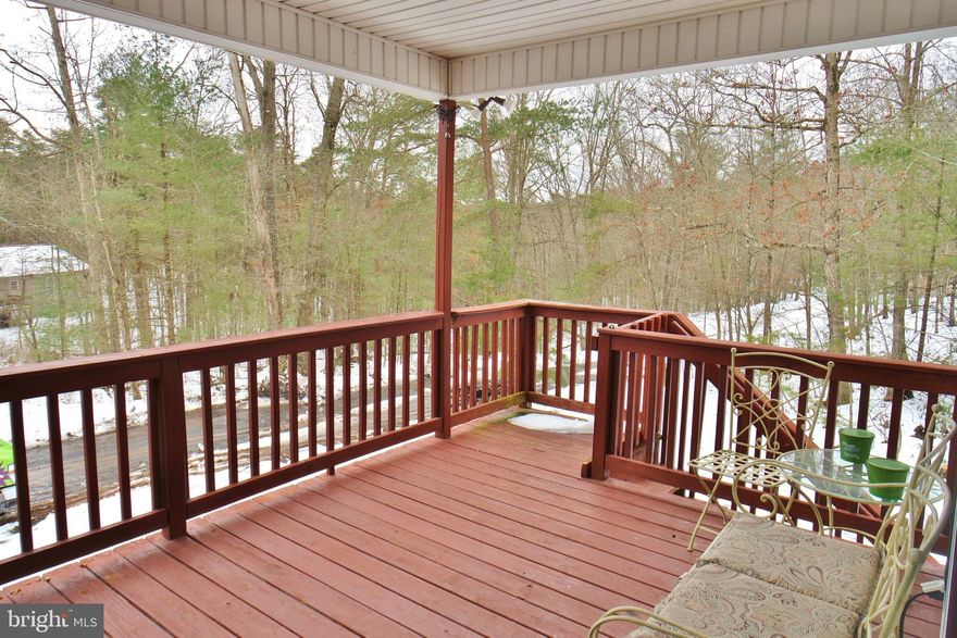 Increased price because of massive updating. - Corner LOT - Country Charm - On Bryce Resort - 6 Minutes to  clubhouse -  New Carpet - Hardwood   Floors - New Bathroom in Basement. 4BR/3BA  Huge new finished family room in basement for your family to enjoy. Outdoor space for entertaining. Move in ready - Newly painted. Just a great place to vacation, raise a family or retire. Light and open airy feel. Lower Level has in addition to a HUGE family room -  a room for an office or study and carpeted storage - all finished walls and new carpet.  Don't miss this one!