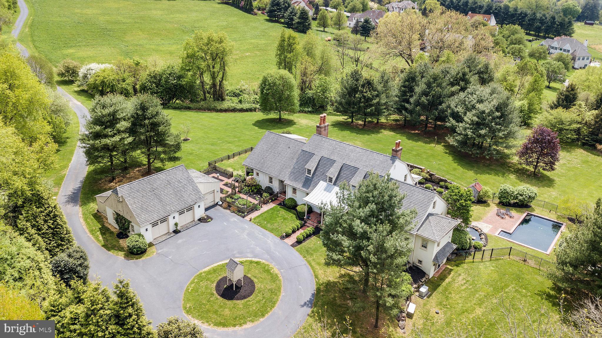 Enjoy the serene setting of this beautiful home that is situated on 5.8 acres in Birmingham Township, Chester County. The english style cottage has exquisite gardens, a pool and a one of a kind labyrinth! As you drive down the driveway, you realize you are about to enter into a very unique home filled with lots of wonderful features. Beautiful random width flooring and old barn beams welcome you into the spacious great room that opens into the kitchen which features maple cabinets an old paving brick floor. The master bedroom is on the main level with two large walk in closets and an updated master bathroom. A large office with gas fireplace is on this level and also another bedroom with a full bath and family room which would be wonderful for a guest or an Au Pair. The upstairs has two large bedrooms with their own updated bathrooms and a smaller bedroom that could also be used for a craft room or a yoga room! This home has an extraordinary amount of custom millwork and reproduction hardware and lighting throughout, capturing the feel and history of Chester County. This home is meticulously maintained and offers breathtaking views from every window. 1159 Meetinghouse Road is convenient to Wilmington and the Route 202 corridor and 30 minutes to the Philadelphia Airport. It also is in the award winning UCFSD school district!