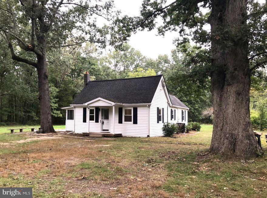 COMPLETELY RENOVATED IN 2023.   2 BEDROOM COTTAGE FOR RENT!  Available Feb 1st.  NO SMOKING, good credit and references required; pets allowed on a case-by-case basis with additional $50/month  non-refundable pet rent.  Situated on 3.73 country acres.  Conveniently located near Orange/Route 20.  Come inside to fresh interior paint, LVP floors, large country kitchen with white cabinets, remodeled bath and nice-sized bedrooms.  Enclosed back porch, patio and small garden shed.  Washer/Dryer included.  Newer efficient electric heat pump, vinyl-clad replacement windows, new pressure tank & water treatment system.  Comcast installed for TV & high speed internet.  Apply online using RentSpree link in the lease details.  $60 application fee/applicant. $200 Repair Deductible. $1700 Security Deposit due at time lease is signed.