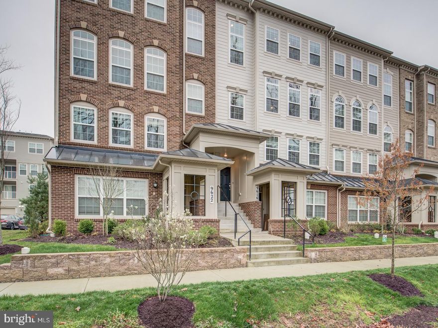 Situated in the serene Seabrook at Willow Park Condominium community, this modern townhome condo, just over 2 years old, offers 3 bedrooms, 2.5 baths, and 2,340 square feet of living space. The meticulously crafted exterior features a covered entrance and rear-loading garage, while the interior boasts an open floor plan, lofty ceilings, and custom accent walls for added sophistication.

Upon entry, a welcoming foyer leads up to the luminous living room adorned with triple arched windows, plank flooring, recessed lighting, and fresh neutral paint. The adjacent dining area offers versatility for gatherings, and the kitchen, designed as the heart of the home, features rich cabinetry, granite countertops, and stainless steel appliances.

Upstairs, the luxurious owner’s suite includes a tray ceiling, walk-in closet, and spa-like bath with dual-sink vanity, soaking tub, and glass-enclosed shower. Two additional bedrooms share access to a hall bath, while a laundry closet adds convenience.

The community offers common grounds, playgrounds, and picnic areas, providing a peaceful retreat. Conveniently located near major routes and commuter options, including MARC, Metro, and NASA Goddard Space Flight Center, this home combines contemporary design, quality craftsmanship, and unbeatable location. Your dream home awaits!