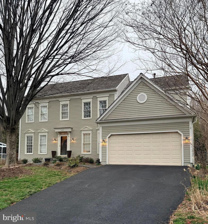 PROFESSIONAL PHOTOS COMING SOON! This beautifully maintained home spans three finished levels, offering space and flexibility for every lifestyle.  From the moment you go through the front door, you will be greeted with newly refinished wood floors that gleam with warmth and character, setting the tone for the elegance found throughout.

Gather and get comfortable in the expansive family room, where natural light pours in through a breathtaking wall of windows dressed with classic planation shutters, creating the perfect balance of brightness and privacy.  On cooler evenings cozy up beside the elegant gas fireplace - the ideal center piece for family movie nights, holiday gatherings, or simply relaxing after a long day.  This is the kind of space that instantly feels like home.

A brand-new gas cooktop in the adjoining spacious kitchen makes cooking such a pleasure. Whether you're whipping up a quick meal or hosting a full dinner party, this kitchen delivers style and functionality to handle it all with ease. The open, generous layout ensures that the chef is always a part of the conversation -- because in this home, every moment is meant to be shared.  The formal dining room adjoins the kitchen.

The primary suite is nothing short of extraordinary, offering the ultimate retreat after a long day.  Prepare to be wowed with this spa-inspired bathroom.  Gorgeous tile work sets an elegant tone, elevating the space with a level of sophistication that is simply stunning!  The built-in cabinetry and vanity provide an abundance of storage while adding a polished, designer finish that is both beautiful and functional.  The large walk-in closet has custom cabinetry as well. When it's time to unwind, the oversized walk-in shower and separate soaking tub are there for you to end your day with pure relaxation.  Whether you're starting your morning with energy or ending your evening, this bathroom transform your daily routine into a 5-star experience.

The huge finished basement delivers an expansive recreation area with endless possibilities - media room, game room, office, gym, or hobby space and plenty of room to spread out.

Once outside, you will discover your own slice of paradise!  Enjoy your evenings on the screened porch, or BBQ on the deck or head into the fully fenced backyard - ideal for entertaining, weekend cookout, with plenty of room for guest and burry babies to have fun and play.  Sitting on a generous .26 ac lot, there is not shortage of outdoor enjoyment. with spring and summer just around the corner, the timing couldn't be more perfect!!

Nestled in one of the area's most sought-after communities, this home offers unbeatable convenience with easy access to major roads while keeping you tucked away in a warm, welcoming neighborhood.  Residents enjoy access to an incredible array of community amenities, including pools, tennis court, basketball court and so much more -- truly a lifestyle, not just a location.