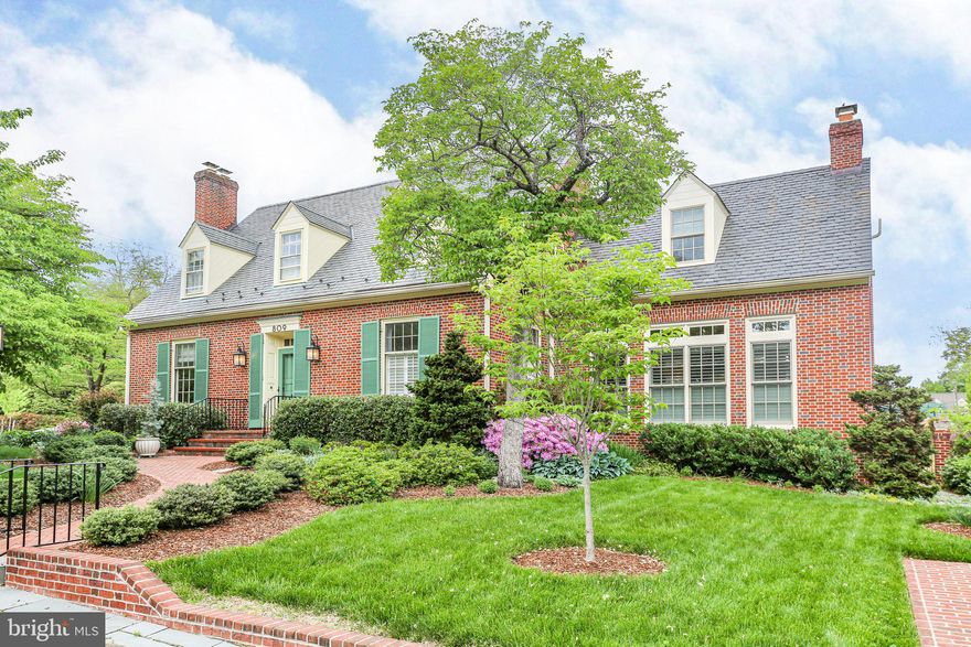 Stunning, immaculate, renovated all-brick cape cod located on a mature 0.25 Acre corner lot in the heart of College Terrace. This impressive property includes 5 bedrooms, 5 bathrooms with 5,033 square feet (4,564 above grade) and (469 below grade). Upon entering the home, you will be greeted with gleaming hardwood flooring that span throughout. The formal living room featuring a wood burning fireplace welcomes you with its beautifully crafted archway, leading seamlessly into the formal dining room, creating a perfect space for entertaining guests. The gourmet, eat-in kitchen features white custom cabinetry, pocket door, marble countertops, recessed lighting, stainless steel appliances, paneled refrigerator, oversized island, and built-in shelving/pantry for all your culinary needs. The kitchen leads to the second/side entrance of the home, greeting you with a beautifully designed space with built-in storage, cork flooring, wet bar with sink, refrigerated drawers (2), ice Machine, and access to the expansive brick patio. Step down from the kitchen to the family room saturated with natural light from the oversized windows adorned with plantation shutters giving privacy when needed. The family room features a wood burning fireplace, built in shelving/cabinetry, motorized TV lift and French doors opening to the brick patio. Completing the main level is a Primary ensuite with carpet flooring, closet, plantation shutters and dual access to the foyer and kitchen (with pocket door). The ensuite bathroom, accessible by a private hallway boasts an expansive walk-in shower with glass door, tile flooring and an oversized vanity. Moving to the second floor you will find the 2nd primary bedroom with garden views featuring his/her closets with custom closet systems, and 2 additional closets giving ample storage. The primary bathroom has tile flooring, dual vanity, soaking tub and glass enclosed tiled shower. This beautiful home boasts a laundry room off the hall to the second bedroom, complete with cork flooring, built-in cabinets, and a convenient drying rack. The second ensuite bedroom (#2) includes 1 walk-in closet and 2 additional closets. The ensuite bathroom boasts tile flooring, pedestal sink, and walk-in shower with subway tile and glass door. The third ensuite bedroom (#3) includes a closet and window seating with built-in storage. The ensuite bathroom features tile flooring, vanity with storage and walk-in shower with subway tile and glass door. Completing the second level is the fourth ensuite bedroom (#4) featuring built-in shelving, built-in desk, and walk-in closet. Access the walkable attic from the second-floor landing giving additional storage for seasonal items. Bring your imagination! The unfinished basement can be used for additional storage or has potential to be a home gym or office. The stunning, enclosed back yard with iron access gates features extensive landscaping, vegetable garden, pergola, Brick sidewalk and retaining wall, and shed. This property boasts off-street parking with two convenient parking pads, one on the side of the house and one at the front for effortless convenience. This beautiful home features an alley that provides convenient access to the sprawling back yard. Additional features of the home are geo-thermal (4-zone), tankless hot water heater, and surround sound throughout the home. Walking distance to local parks, University of Mary Washington, shops, and restaurants. Just minutes to VRE, and access to I-95. This home truly has it all. Don't miss your chance to make this dream home yours!