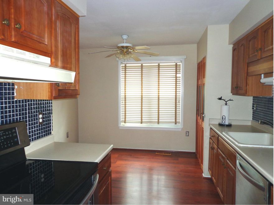 SS Kitchen Appls Sparkles w/Kraftmade Cabinets & Brazilian Cherry Hardwd FlrsThroughout Main Lvl Breakfast Rm Huge Rec Rm Wet Bar! Newer Siding! 200 Sq Ft Deck Fenced Tiered Landscaped Backyd w/Sheds 33 Steps to Tot Lot 200 steps to Lake Royal Enjoy 1/2 mile walk toVRE 1/4 mile toTarget Yet in the Woods! Shopping Restaurants Round the Corner #19 Park Spot*All Burke Cent Amenities Available