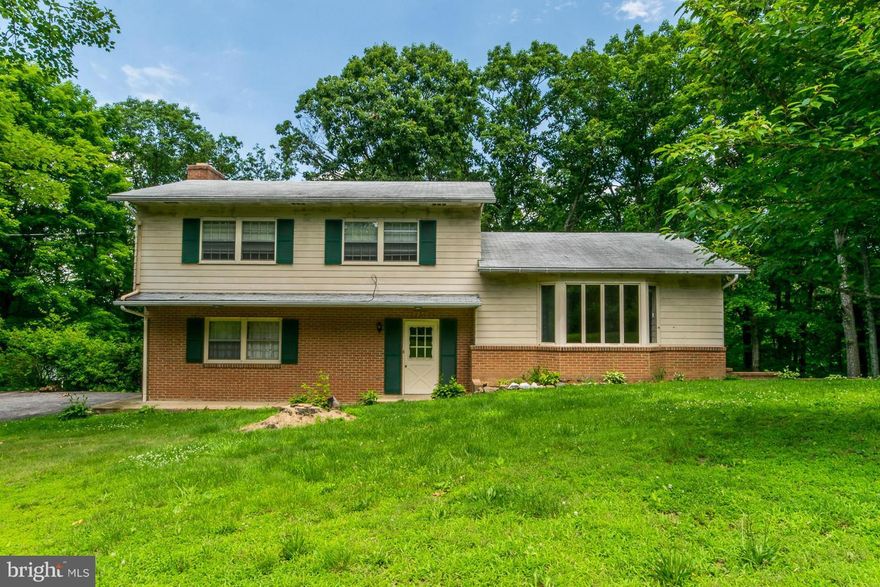 Tri level home on basement and crawl space with one car garage located in quiet private neighborhood. 2nd house from end of non-outlet street. 3BR, 2BA with family room and wood fireplace. Dining room has glass doors to side porch and patio. Paved driveway, nice yard and views. Great location close to town but like living in the country. Needs work and renovation was a rental last five years.