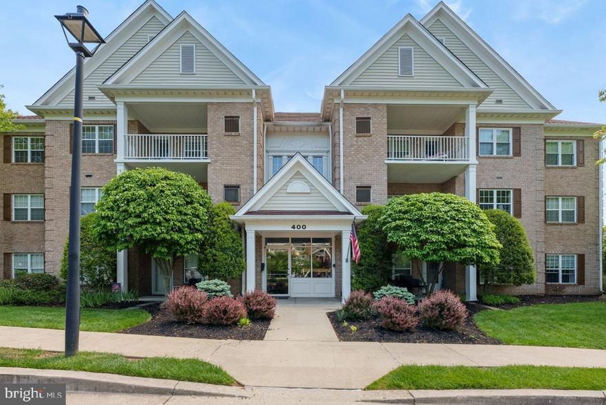 Welcome to easy, comfortable living in sought-after Mays Chapel! This first-floor condo at 400 Plumbridge Court, Unit 102 offers a wonderful blend of convenience, privacy, and low-maintenance living. Tucked at the rear of the building, this unit enjoys a peaceful setting with a private patio overlooking the woods — the perfect spot for morning coffee, quiet reading, or simply enjoying a little nature.

Inside, you’ll find a bright and open floor plan with hardwood floors throughout, a spacious living area with a cozy gas fireplace, and great flow for everyday living or entertaining. The kitchen opens nicely to the main living spaces, creating a warm and welcoming feel. The condo features 2 bedrooms and 2 full baths, including a comfortable primary suite, plus plenty of closet and storage space throughout.

With first-floor access, wooded views, and a private rear location, this is a wonderful opportunity to enjoy the ease of condo living in a super convenient Timonium location close to shopping, dining, medical offices, and major commuter routes. A peaceful retreat without being tucked away from everything — the best of both worlds!