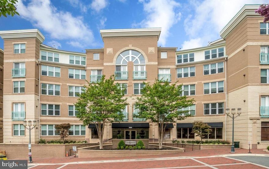 Steps to shops, bars, restaurants, & activities in Reston TownCenter. 2 assigned garage spots! New HVAC & hot water heater. Amenities: gym, business center, concierge, game room, pool, & party rooms. Quiet interior condo w/ balcony that faces manicured courtyard/pool. Updated Kit w/ granite, GE SS apps, 42" cabs, & marble flooring. Bonus custom dry bar addition w/ granite & storage. Gas FP. Custom closet organizers in BR. Newly updated bathroom. Must see!https://apply.link/39wfq8K