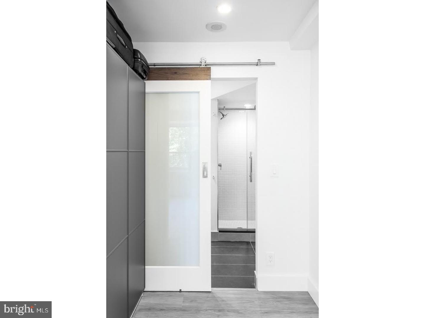 FEATURED ON ZILLOW'S INSTAGRAM AND SNAPCHAT ACCOUNTS FOR TINY HOUSE WEEK! Studio living Philadelphia hasn't seen before. Completely renovated condo overlooking Rittenhouse Square. This is truly a studio you don't want to miss. The owners thoughtfully designed this space to fit with your lifestyle. This incredible rental has the look and feel of a five-star extended stay hotel. Walk into a full kitchen with high gloss white cabinetry, top of the line appliances, quartz countertops, and a sleek sink and faucet. Kitchen features include: under cabinet lighting plus outlet strips, stylish backsplash, garbage disposal, full size dishwasher, and overall impeccable design. The living area includes a smart HD TV with swivel bracket, recessed lighting with dimmers, large plank flooring, four USB outlets, attractive roller shades, a dresser plus a large coat closet. Enter the over-sized bathroom through a very cool barn door. The bathroom features a custom shower with a glass door, floating vanity, LED mirror, Toto toilet, LG washer/dryer, recessed lighting with dimmers, multiple outlets and plenty of storage for linens and cleaning supplies. The Rittenhouse Savoy is located directly on the South side of Rittenhouse Square. The building has 24 hour desk services, a roof deck with panoramic views of the city and a fitness facility. Short walk to UPENN, Drexel University, Chop, Jefferson Hospital, 30th Street Station, Schuylkill River Park, high end retail and Philadelphia's best bars, cafes, and restaurants. All utilities included!