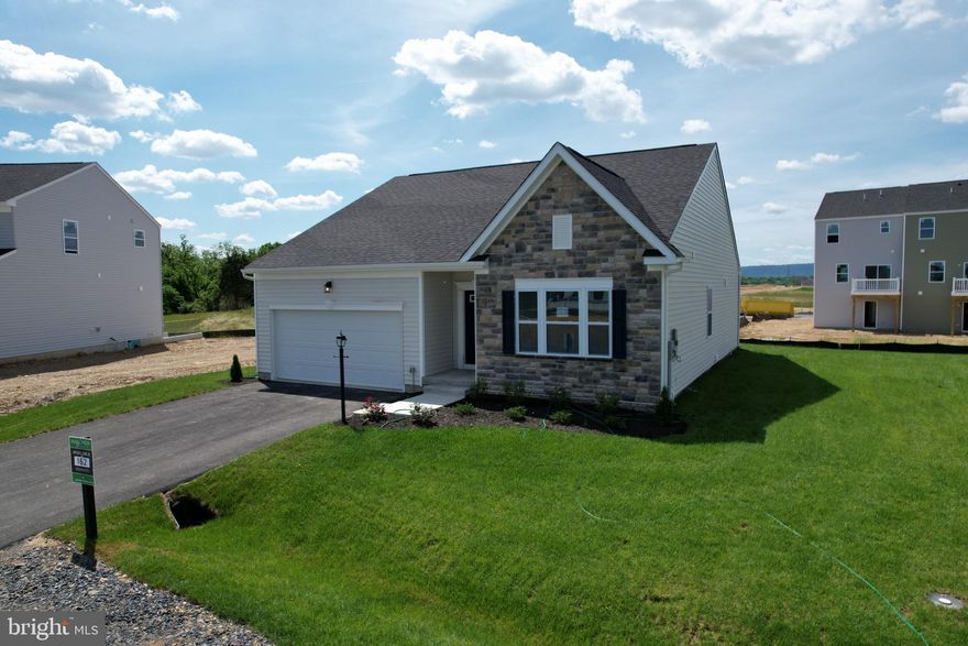 Ready to make your move this Summer? Discover Avalon by Maronda Homes! Perfect for those craving single-story living with a layout designed for convenience. Experience the seamless flow of the open floor plan, complete with a spacious kitchen boasting a charming breakfast nook and island. Enjoy granite countertops and stainless steel appliances. With two additional bedrooms, this home effortlessly accommodates various lifestyles. Home also features LARGE unfinished basement with rough in for future bath and double welled walk up stairs to rear yard.  CALL FOR TOUR (Please note: Photos shown are of a similar model for illustrative purposes.)