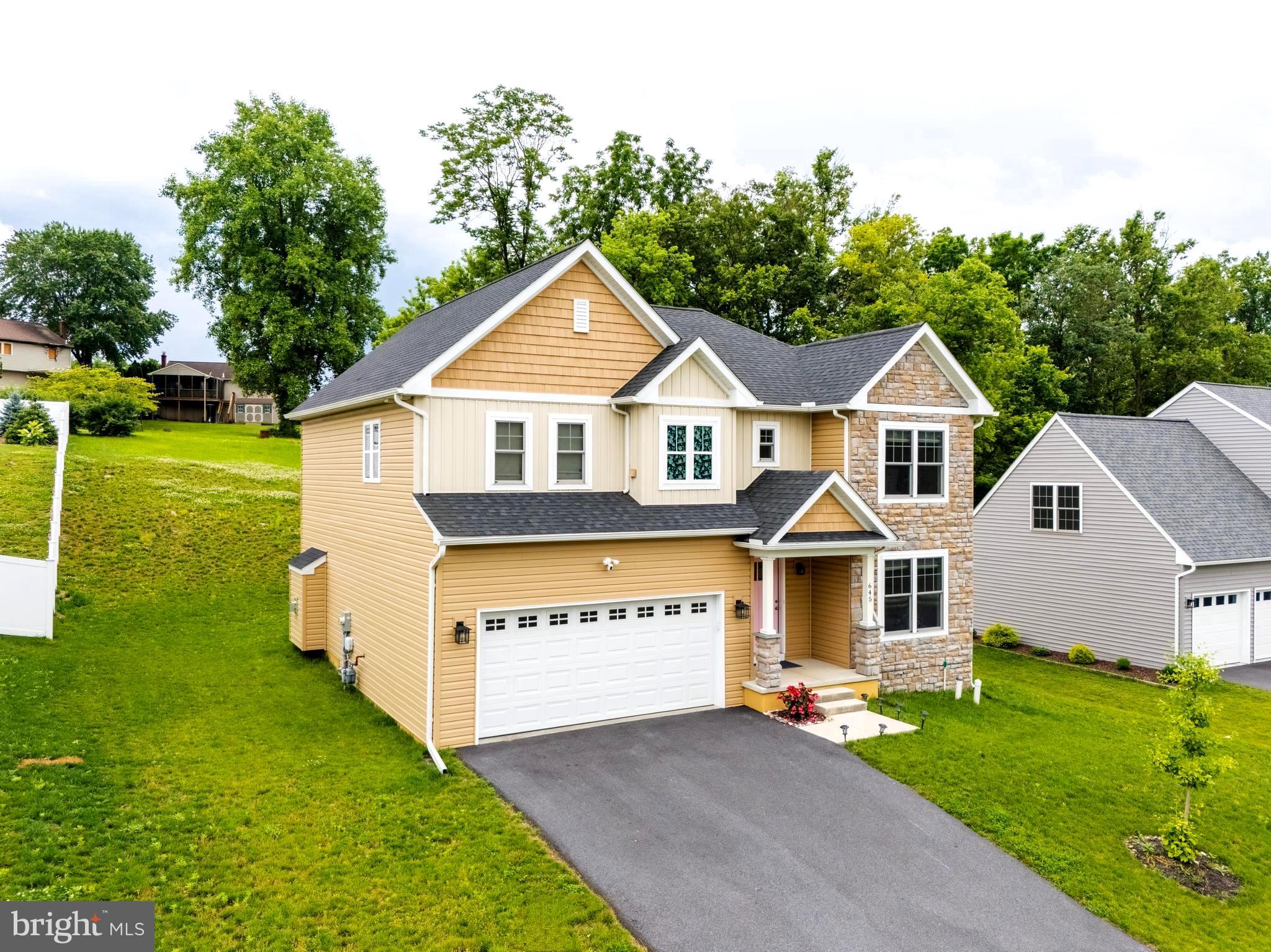Welcome to this stunning 4/5-bedroom, 2.5-bath custom-built home in The Reserve at Windolph Landing—one of Lancaster's most desirable communities! Built in 2022 and freshly painted throughout, this move-in-ready home combines thoughtful design, quality finishes, and modern comfort just minutes from Lancaster City’s shops, restaurants, and attractions.
Step inside to find luxury vinyl plank flooring throughout the entire home, offering a sleek, durable, and low-maintenance living experience. The open-concept main level features a spacious living room with an upgraded stone fireplace and flows seamlessly into a beautifully appointed kitchen. You'll love the granite countertops, custom cabinetry, and all-new stainless steel appliances—fully included in the sale.
A flexible main-floor bedroom provides the perfect space for guests, a home office, or a playroom—tailored to your needs.
Upstairs, the home offers four generously sized bedrooms, including a luxurious primary suite complete with a tiled shower, soaking tub, dual vanity, and walk-in closet. The laundry is also conveniently located on the second floor for added ease. ( *Brand new smart Washer/Dryer included on sale )
The full basement provides over 1,000 sq ft of unfinished space with an egress window and bathroom rough-in, giving you endless potential to expand.
Skip the wait for new construction—this home is better than new and ready for its next chapter.
📞 Don’t miss out—schedule your private tour today!