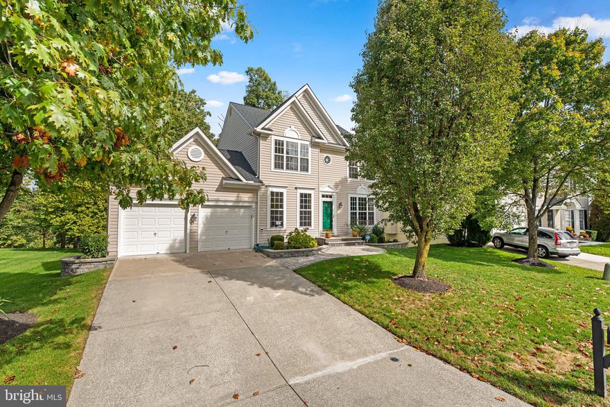 Must see 3 finished level 2-car garage colonial in sought after Lyndwood on a prime lot backing to golf course! Relax on the rear expansive deck and enjoy the private wooded views overlooking the fairway. Endless upgrades include: new roof (2016); new HVAC (2013); new water heater (2011); lawn irrigation system; tall 9' ceilings; remodeled (2018) eat-in kitchen w/soft closing drawers, 42" cabinets, quartz counters and upgraded stainless steel appliances (2016-2022); family room directly off  the kitchen w/warm wood burning fireplace; separate living and dining rooms; 1st floor powder room; gleaming hardwoods on the main level; new carpeting on main and upper levels; upper level w/4 bedrooms and 2 full bathrooms; owner's suite w/soaring cathedral ceilings, walk-in closet and spa like en suite full bathroom w/double sinks, walk-in shower and separate tub; fully finished lower level w/expansive rec room w/full size windows and walk-out to rear yard, 3rd full bathroom, bonus room ideal for a home office or guest bedroom and storage/utility room; recessed lighting; freshly painted; new garage door openers (2019); custom brick paver front walkway at entrance. An amazing location to Timbers at Troy Golf Course and Lyndwood shopping center featuring Giant Food Store, a bagel store, gym, salon, multiple restaurants, bank branch office and more. Minutes to major commuter routes Rt 100, I-95, Ft. Meade, NSA, Baltimore, DC and BWI.