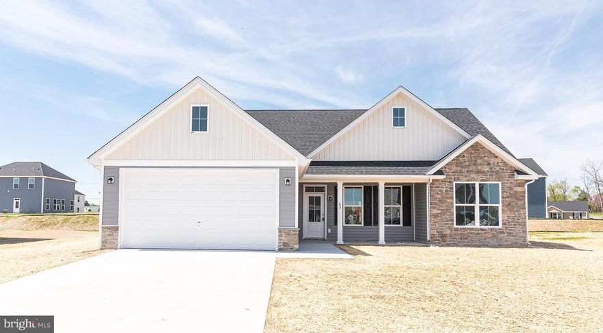 To Be Built on choice of 1 acre Lot with public sewer and private well.   Just over 1700 sqft rancher offering open floor plan with vaulted ceilings in main living areas, 9ft ceilings in bedrooms, and tray ceiling in Primary Bedroom with recessed lights. The Primary Bath features large tile shower . Kitchen is upgraded with large center island, granite countertops, Stainless steel appliances, and upgraded cabinetry including pantry. The 14x16 sunroom has vaulted ceilings and opens to 14x12 rear concrete patio. Front porch, stone on front of home, 2-car attached garage and additional 24x28 2-car detached garage, and paved driveway are all included.  Builder offers $10,000 towards purchasers closing cost.  Similar Construction available to view  *Photos are similar construction