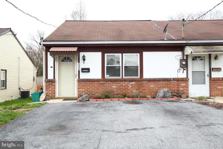Bright end unit features two large bedrooms, living room and family room.  The rear deck overlooks the backyard.  A shed with electric adds additional storage space.  This home is close to the elementary school and amenities.  With some TLC, make this home yours.  Being sold AS-IS.