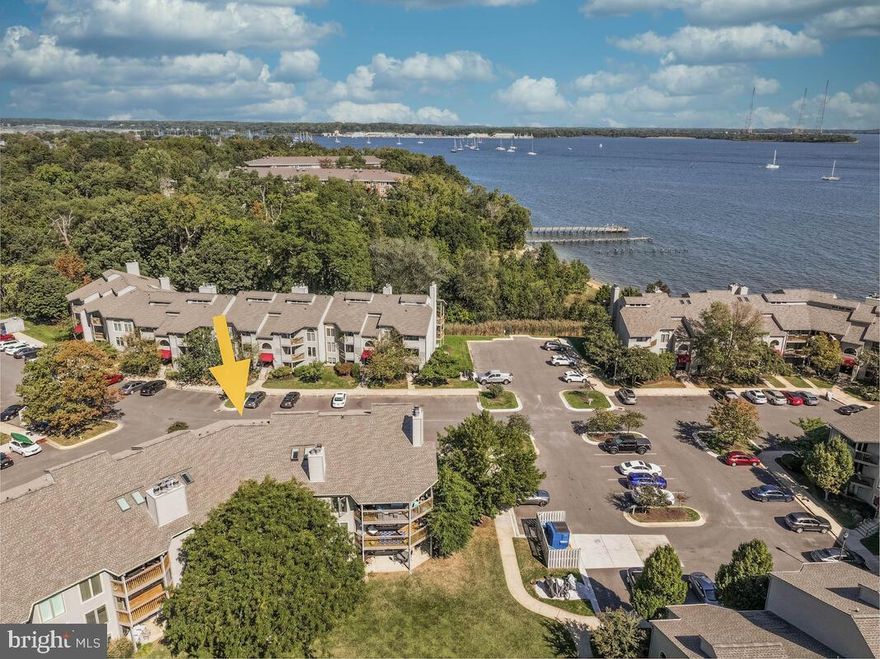 PRICE PRICE PRICE!!!!  Welcome to Chesapeake Harbour! This beautifully updated Marina VIEW 2-bedroom, 2-bath condo offers the perfect mix of comfort, style, and easy living in one of Annapolis’s most sought-after waterfront communities.
Inside, you’ll find a fresh and modern vibe with a little fresh paint accented with ceiling fans throughout, new bamboo flooring, and a delightfully unique wooden fireplace mantel adding a cozy, custom touch to the living space. The open layout flows effortlessly from the living room to the dining area and kitchen, making it great for entertaining or just relaxing at home.
The kitchen has been upgraded with a new countertop, sink and faucet, and new dishwasher, plus stainless-steel appliances including a self-cleaning oven and built-in microwave.  The Refrigerator is being replaced and will be sparkly and new!There are even a new washer and dryer tucked away for convenience. Both bathrooms have been refreshed with stylish upgrades, giving the whole place a clean, contemporary feel.
The primary suite is a peaceful retreat with its own en-suite bath and plenty of closet space. The second bedroom and bath are perfect for guests, a home office, or whatever suits your lifestyle.
Step out onto your private balcony to enjoy views of the marina and Chesapeake Bay—ideal for morning coffee or evening wine. And when you're ready to get out and about, the community has it all: a private beach, two pools, tennis courts, jogging paths, and 24/7 gated security. Need an EV charge for your car.  It's here.  Take a stroll along walking path along the marina and enjoy a meal at the on-site restaurant. There’s even water access for boating enthusiasts!
With off-street parking and services like lawn care and exterior maintenance included, this home makes it easy to enjoy the good life without the hassle.
Whether you're looking for a weekend getaway or a full-time residence, this Chesapeake Harbour gem feels like a vacation every day.